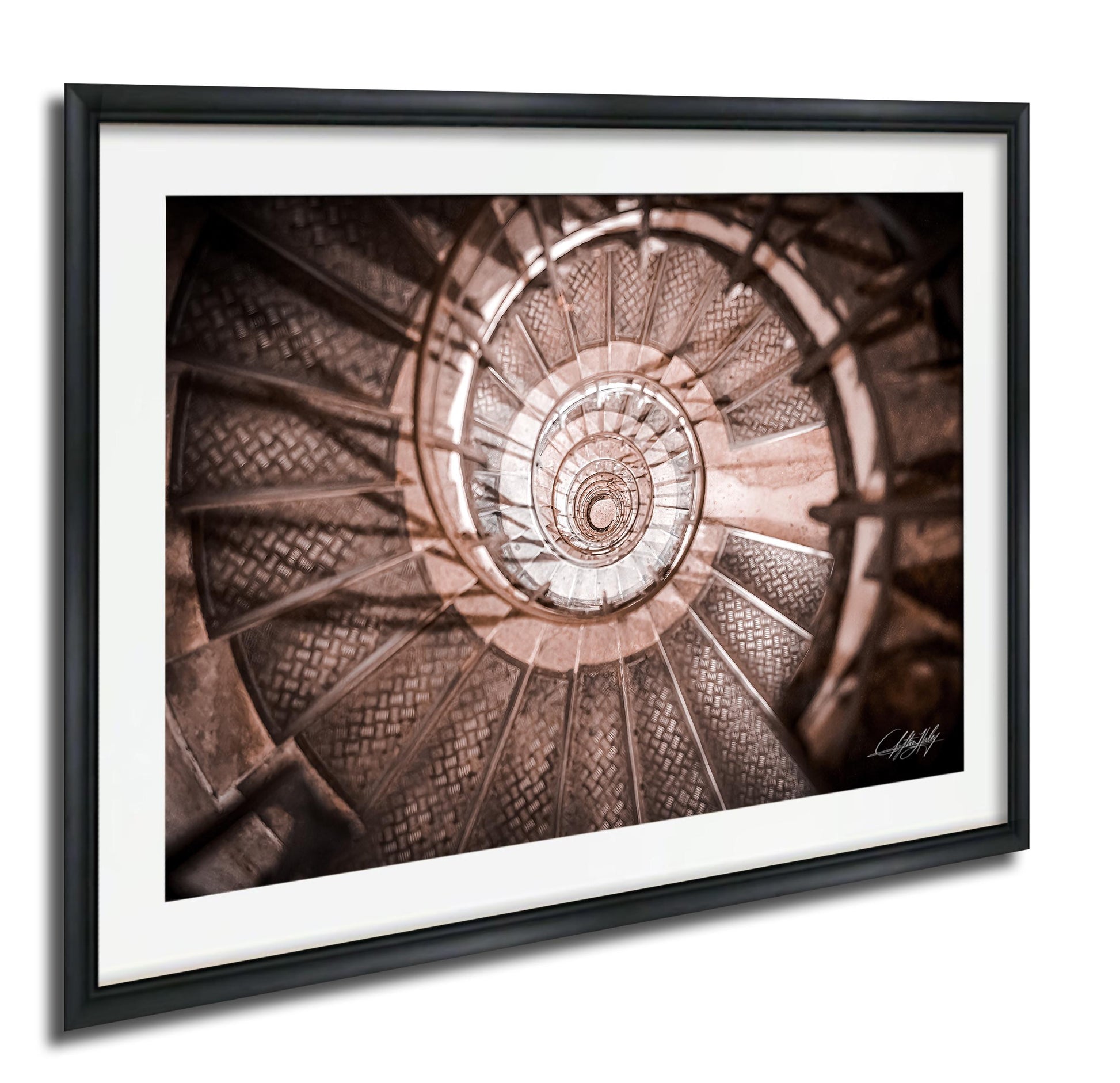 The image is a spiral staircase with a repeating pattern of steps, creating a visually striking and intricate design.