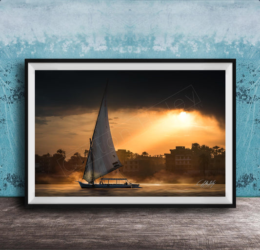 felucca sailboat art, nile river sunset print, luxor egypt fine art, egypt river photography, luxury travel wall art, serene river landscape, egyptian culture artwork, nile boat photography, sunset fine art print, timeless travel decor, historic river wall art, luxury collector photography, egypt fine art print, calming interior artwork
