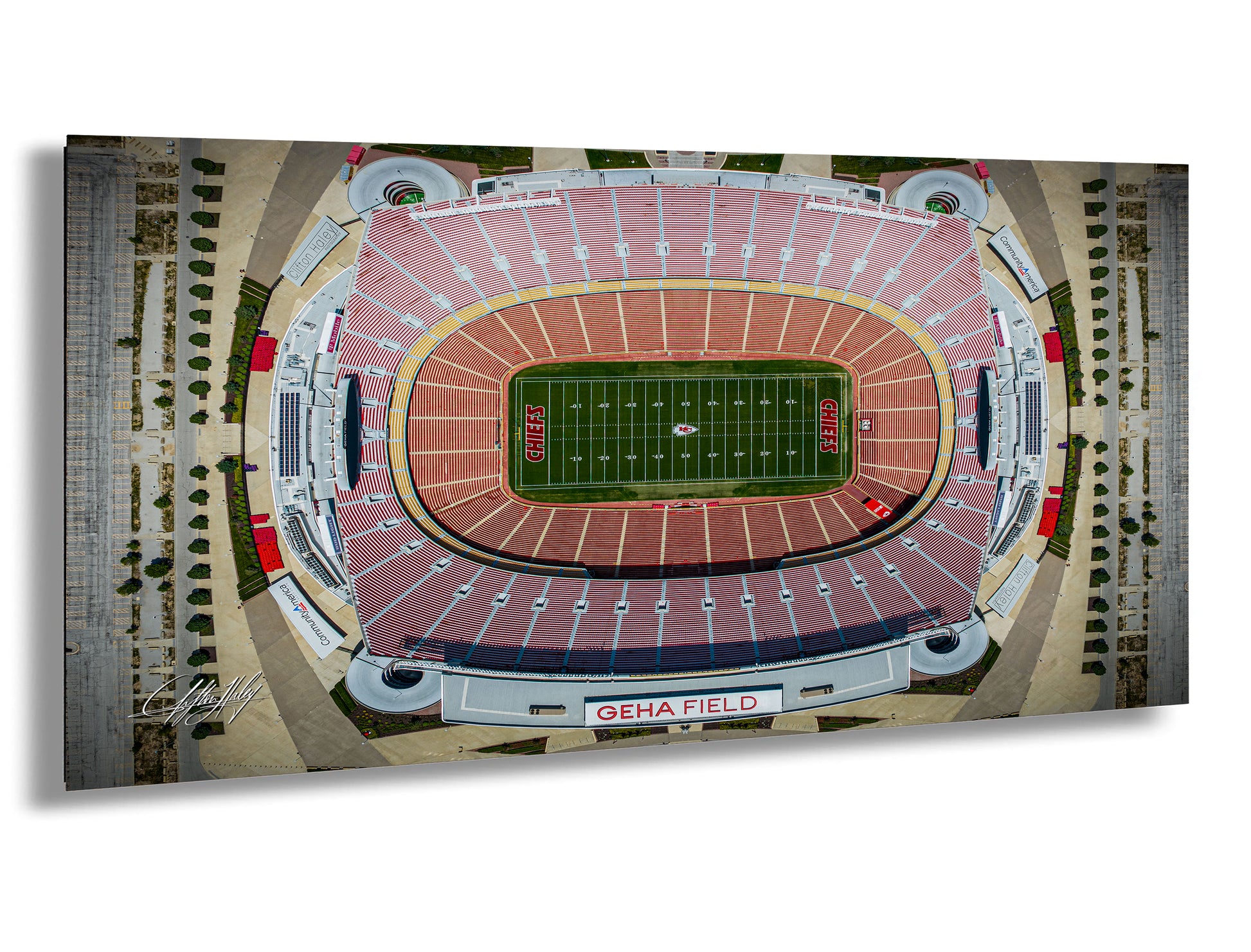 The image is an aerial view of a football stadium, specifically the Kansas City Chiefs stadium, with the football field prominently displayed.