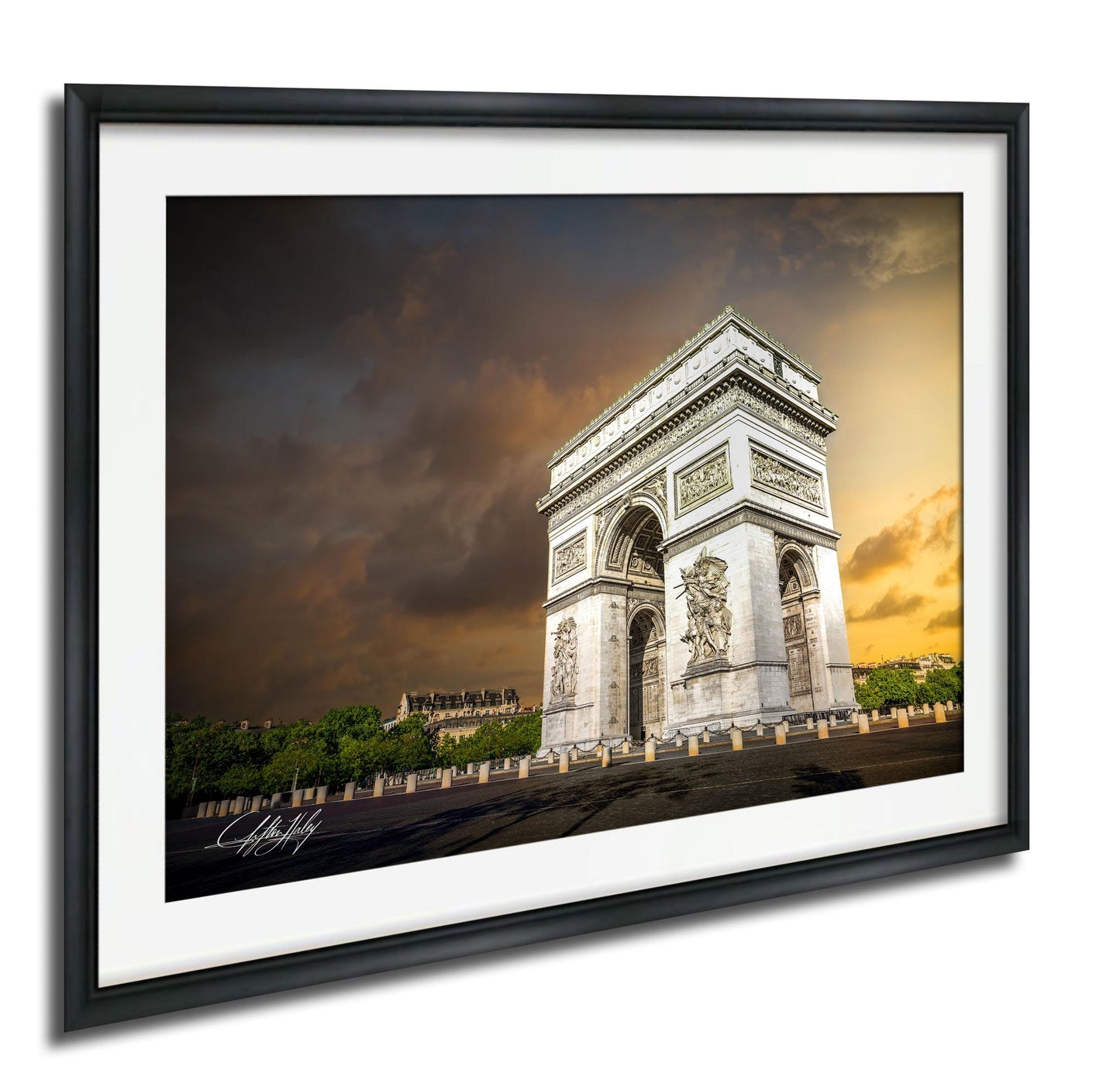 the Arc de Triomphe, a famous monument in Paris, France, with a dramatic sky in the background.