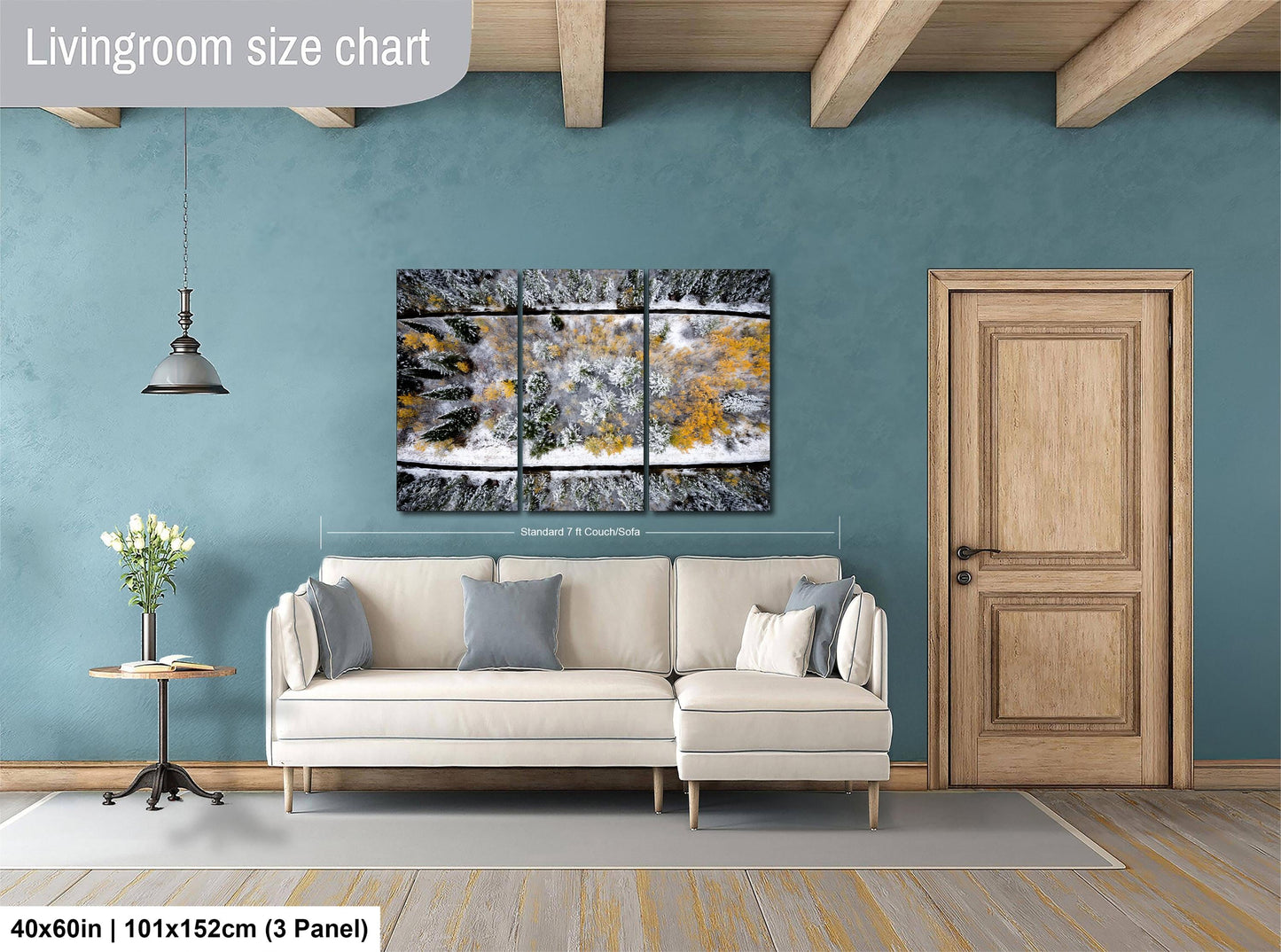 a living room with a large, colorful abstract painting hanging on the wall above a white sofa. The painting is composed of three panels, each depicting different elements of the scene. The room has a wooden door, a small table with a vase of flowers, and a wooden beam ceiling. The living room size chart indicates that the space is approximately 40'x60', with a total of 3 panels.