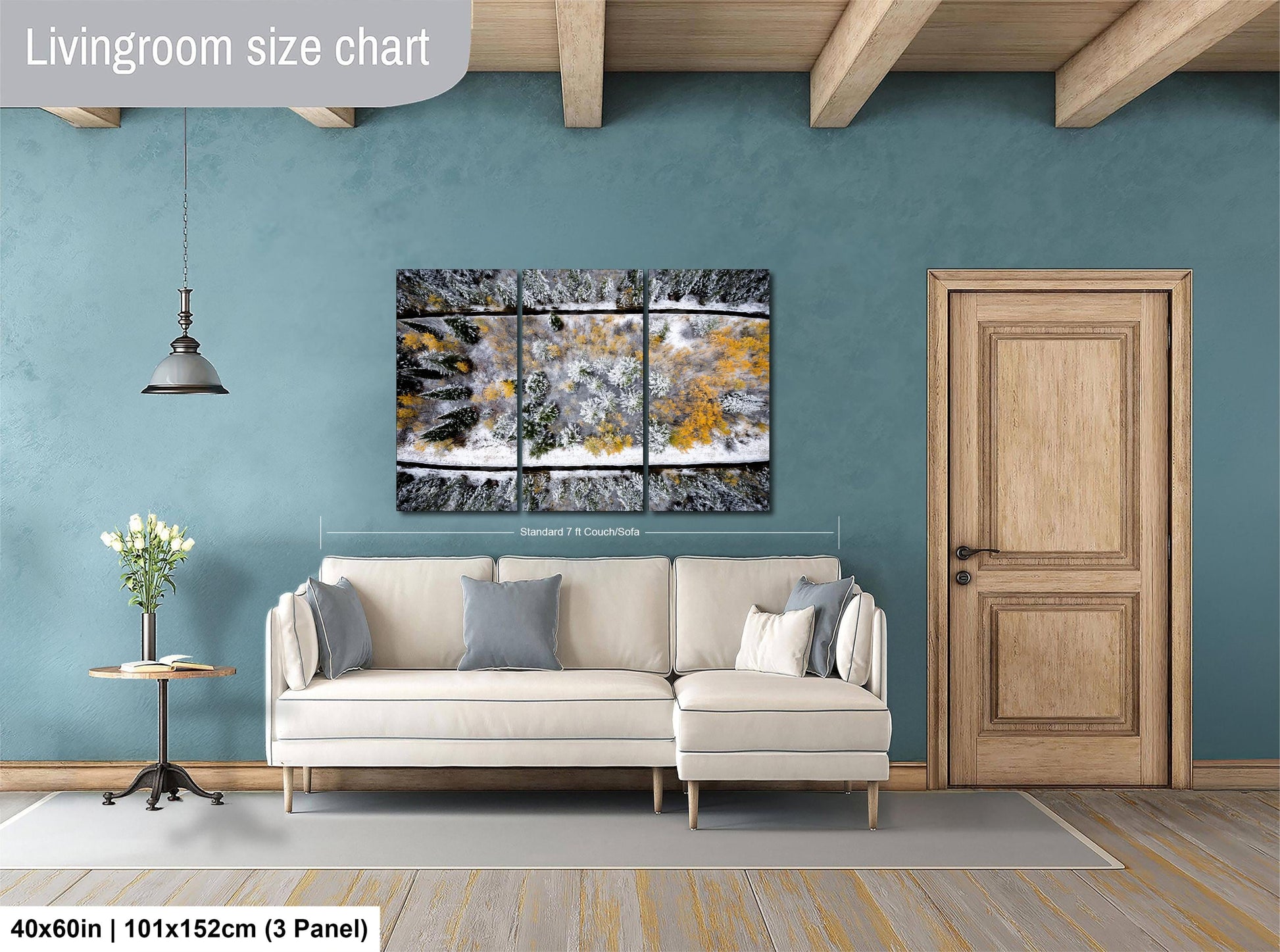 a living room with a large, colorful abstract painting hanging on the wall above a white sofa. The painting is composed of three panels, each depicting different elements of the scene. The room has a wooden door, a small table with a vase of flowers, and a wooden beam ceiling. The living room size chart indicates that the space is approximately 40'x60', with a total of 3 panels.