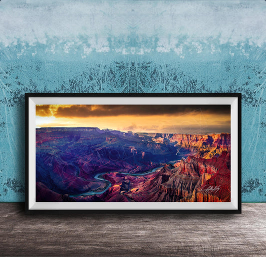 The image is a framed photograph of the Grand Canyon, showcasing the stunning natural landscape with a vibrant sunset over the canyon.