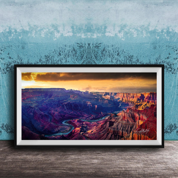 The image is a framed photograph of the Grand Canyon, showcasing the stunning natural landscape with a vibrant sunset over the canyon.