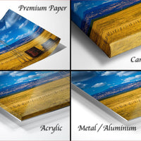 The image is a collage of four different views of a landscape, including a windmill, a field, a city skyline, and a sunset.