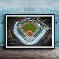 An aerial view of a baseball stadium, with the field, seating areas, and surrounding infrastructure clearly visible.