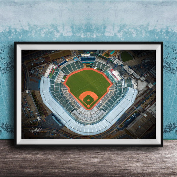 An aerial view of a baseball stadium, with the field, seating areas, and surrounding infrastructure clearly visible.