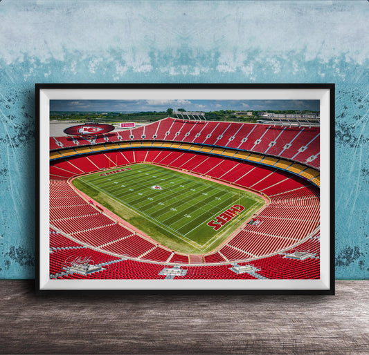 The image is a framed photograph of a football stadium, specifically Kansas City Chiefs Stadium, with a view of the field and seating areas.