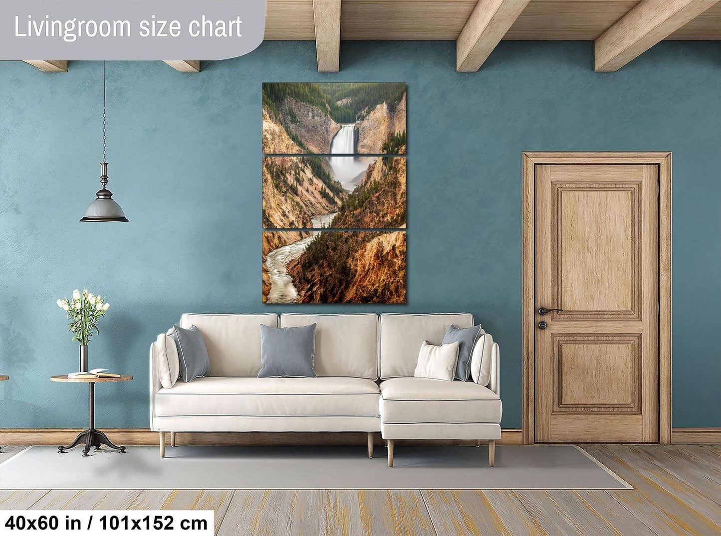 a living room with a large, high-quality, three-piece living room size chart hanging on the wall. The chart provides a visual representation of the living room's dimensions, with the left side measuring 40'60" (51.52" x 0.82"), the middle section at 101'152" (51.52" x 0.82"), and the right side at 51'52" (51.52" x 0.82"). The living room features a white sofa, a wooden door, and a vase of flowers on a table.