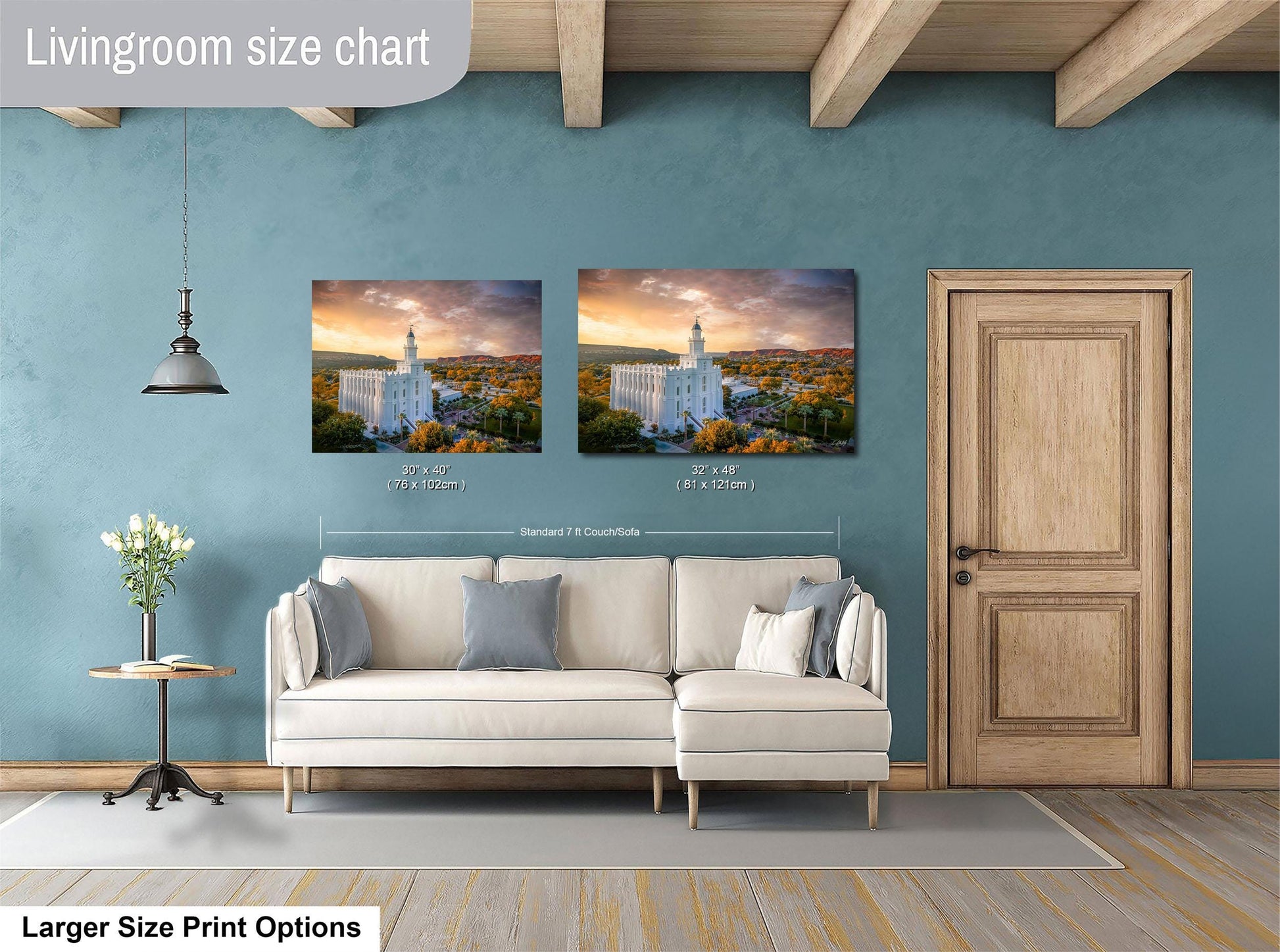 a living room with a white sofa, a wooden door, and a painting of a building on the wall.