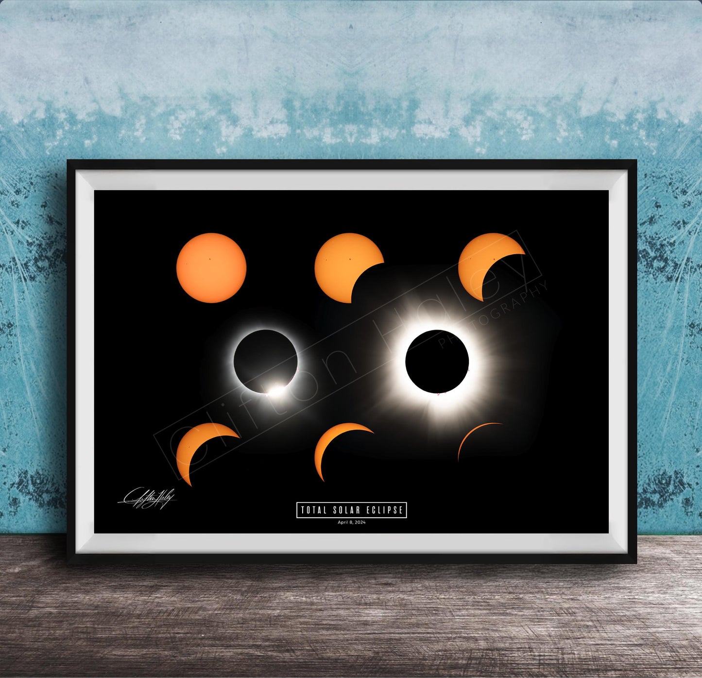 The image is a framed poster depicting the total solar eclipse, showing the moon, sun, and various stages of the eclipse.