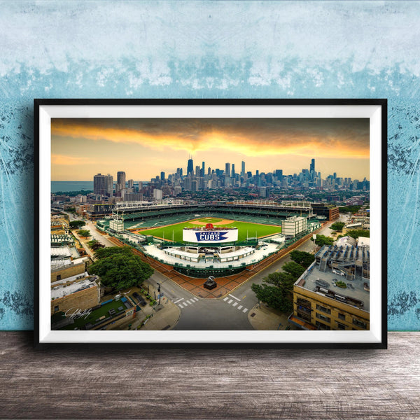 The image is a framed photograph of a baseball stadium in Chicago, Illinois, with the city skyline in the background.