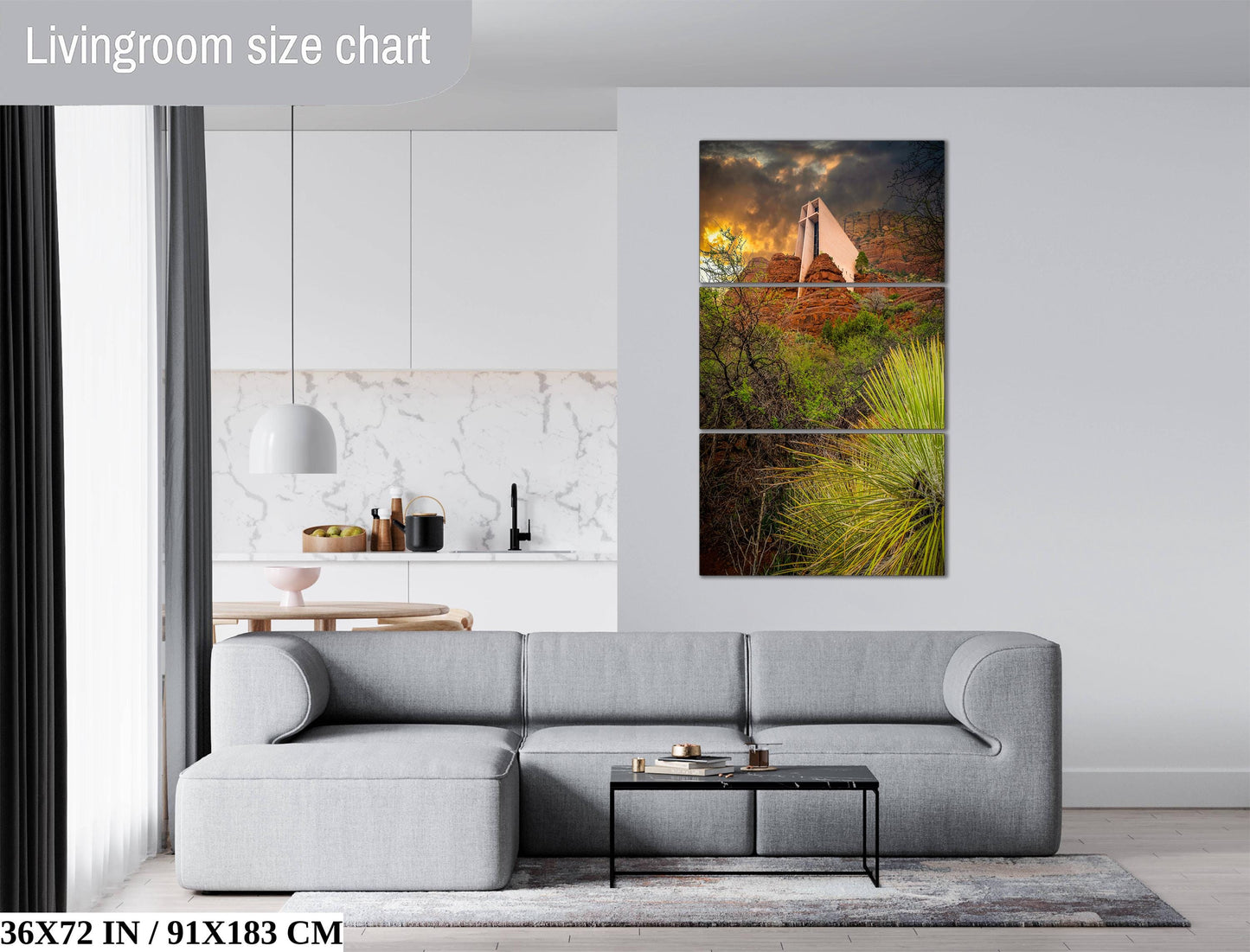 The image is a living room with a gray sofa, a coffee table, and a painting of a desert landscape hanging on the wall.