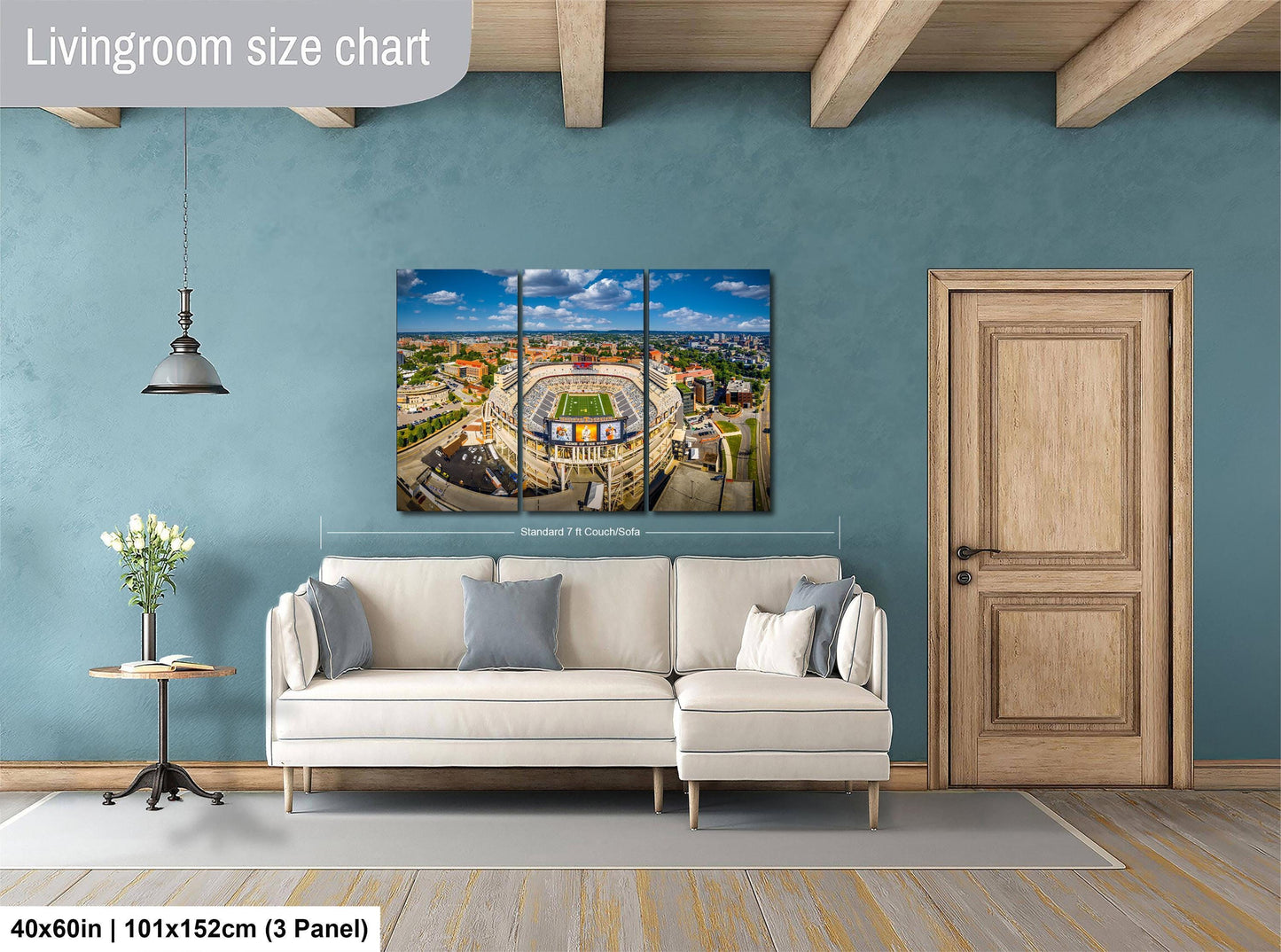 The image is a living room with a large, three-panel living room size chart on the wall. The chart provides dimensions for the living room, including the length, width, and height. The living room is furnished with a white sofa and a wooden door, and there is a vase of flowers on a table nearby.