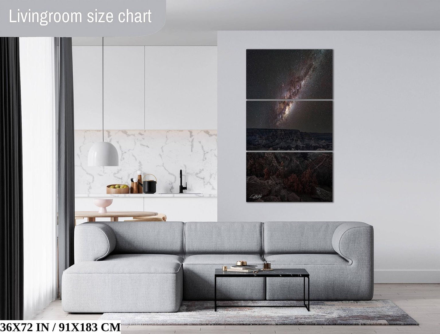 The image is a modern living room with a gray sectional sofa, a coffee table, and a large wall art depicting a galaxy. The room has a minimalist and clean design, with white walls and a marble-like backsplash.