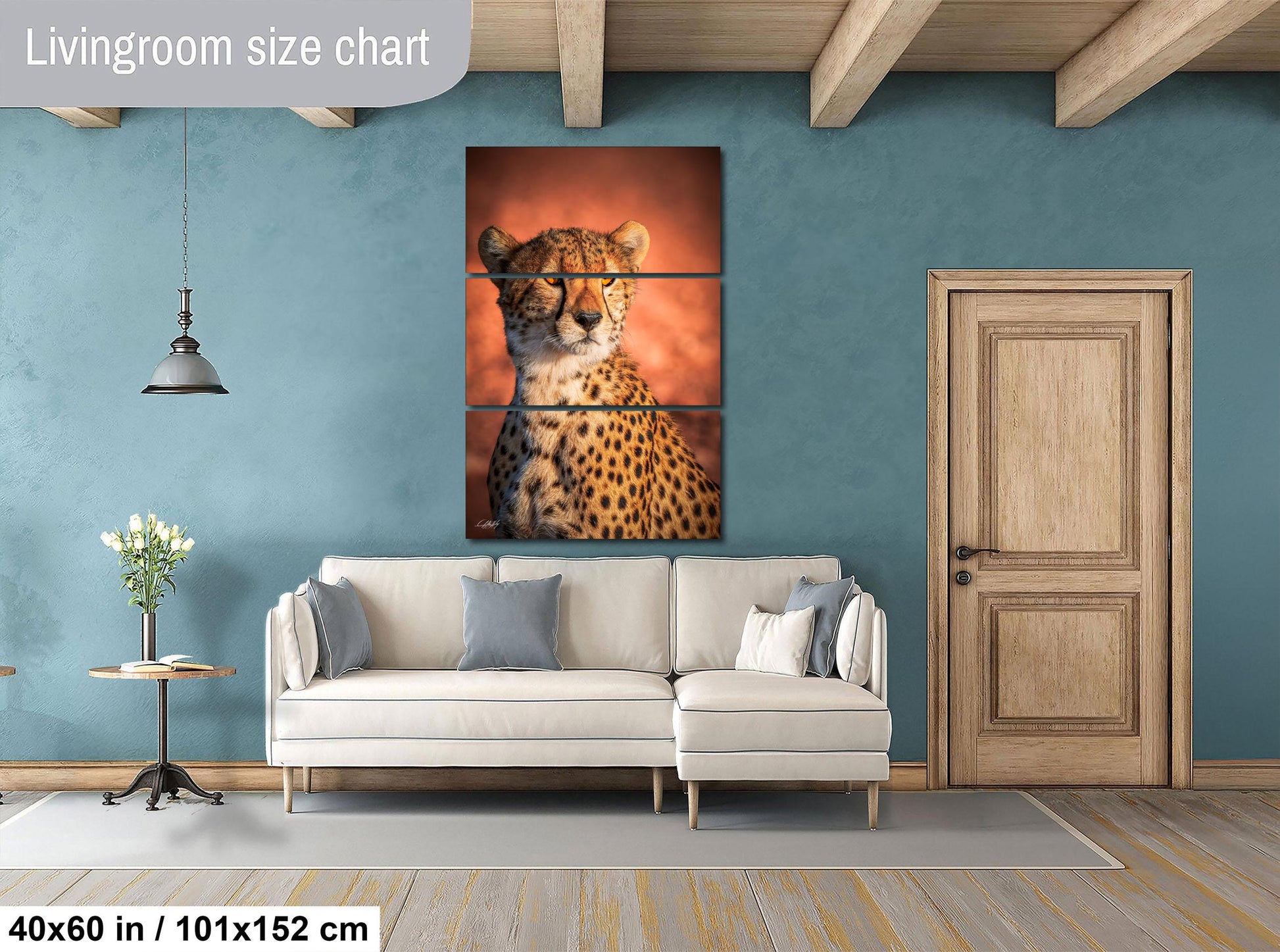 The image is a living room with a large, three-piece wall art depicting a cheetah. The cheetah is the focal point of the room, with a white sofa and a wooden door nearby. The wall art is framed in a way that it appears to be a collage of smaller images, creating a visually interesting and dynamic display.