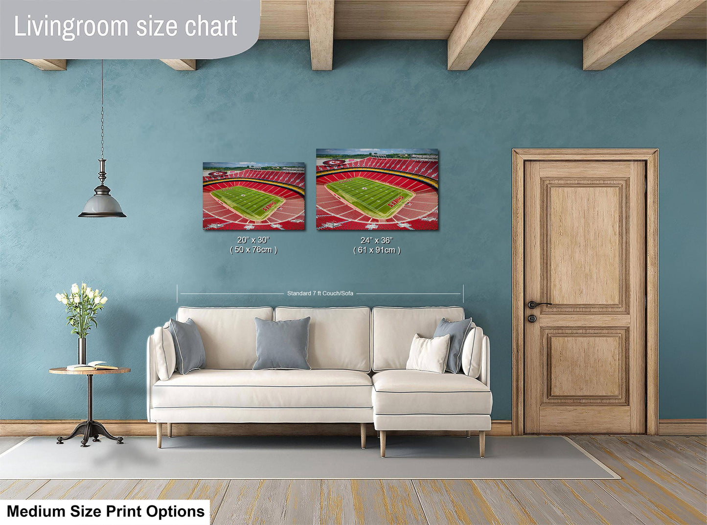 a living room with a white sofa, a wooden door, and a painting of a stadium on the wall. The painting is of a sports field, and the sofa is positioned in front of it. The living room appears to be well-lit and decorated, with a potted plant and a vase adding to the ambiance.