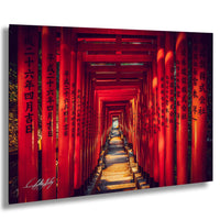 A long, narrow path lined with red torii gates leading to a bright light at the end, creating a striking and visually captivating scene.