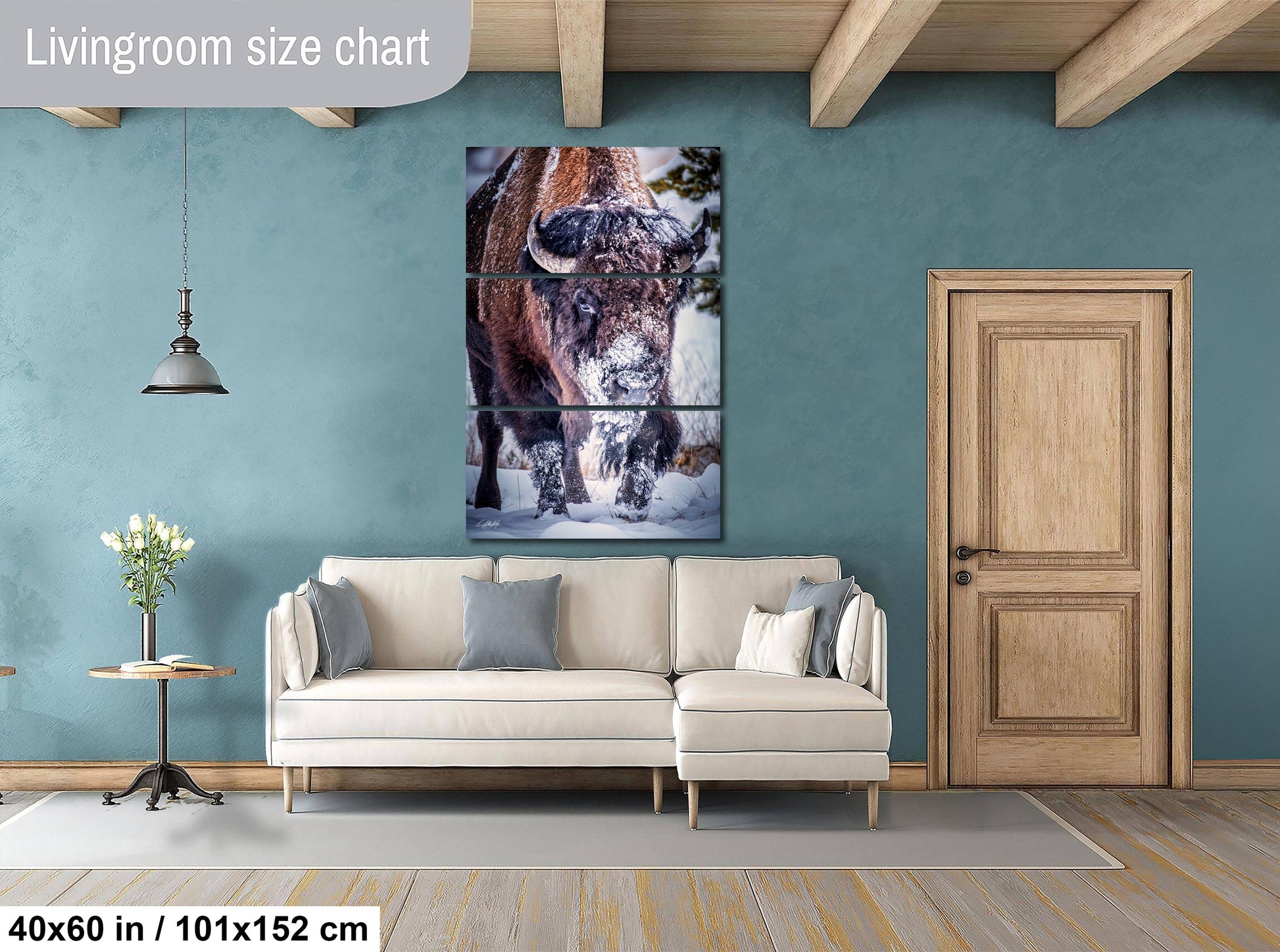 a living room with a couch and a painting on the wall