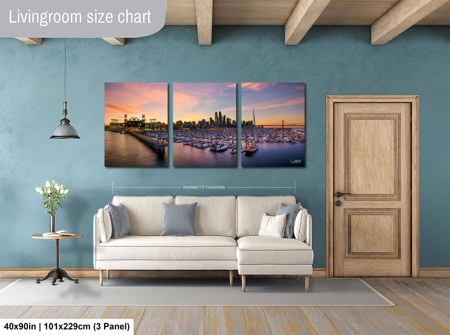The image is a living room with a large, three-panel living room size chart on the wall. The chart displays the dimensions of the living room in feet and inches, with the largest panel measuring 40'x50'', the medium panel measuring 101'x129'', and the smallest panel measuring 3'x3''.