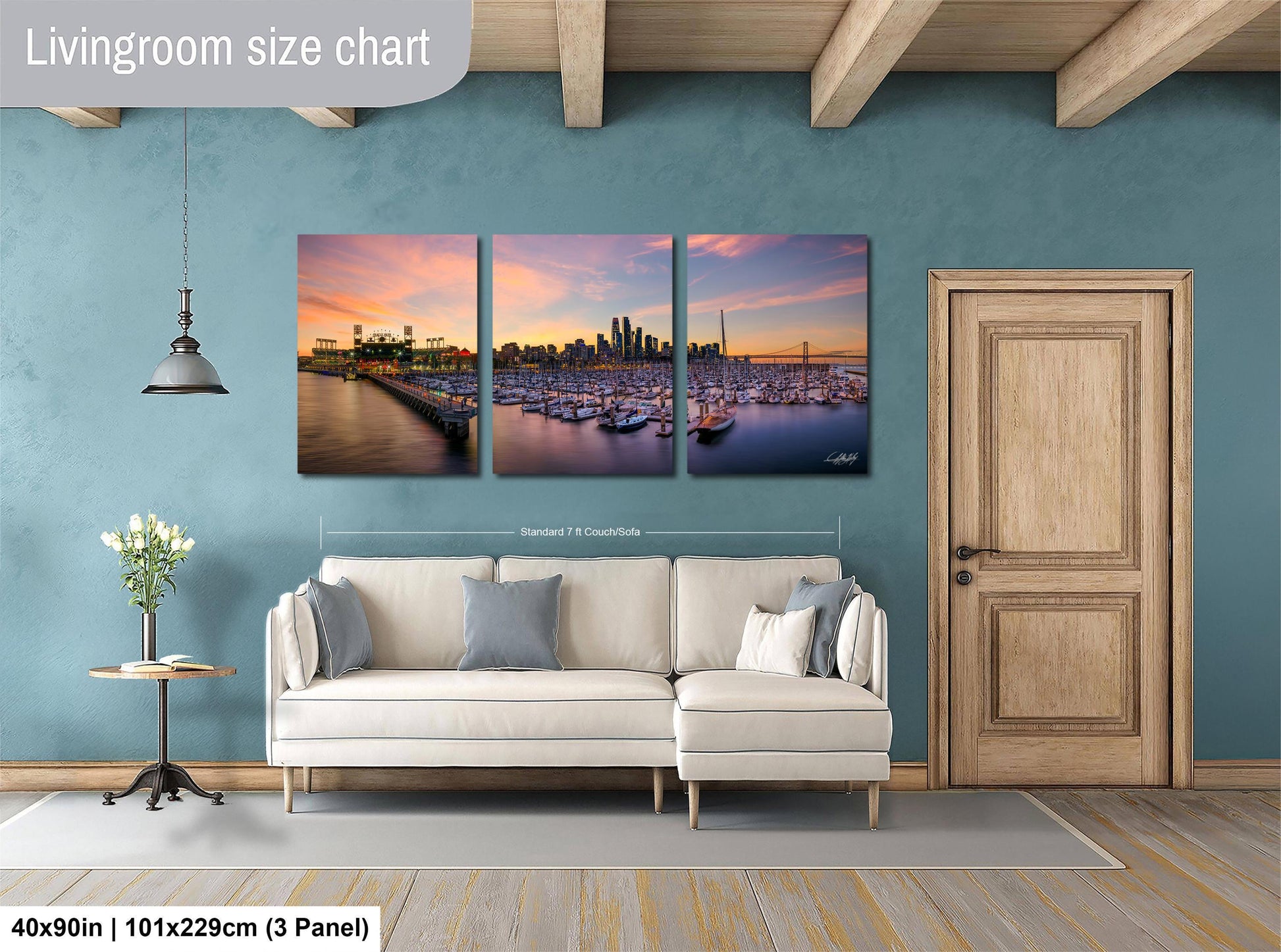 The image is a living room with a large, three-panel living room size chart on the wall. The chart displays the dimensions of the living room in feet and inches, with the largest panel measuring 40'x50'', the medium panel measuring 101'x129'', and the smallest panel measuring 3'x3''.