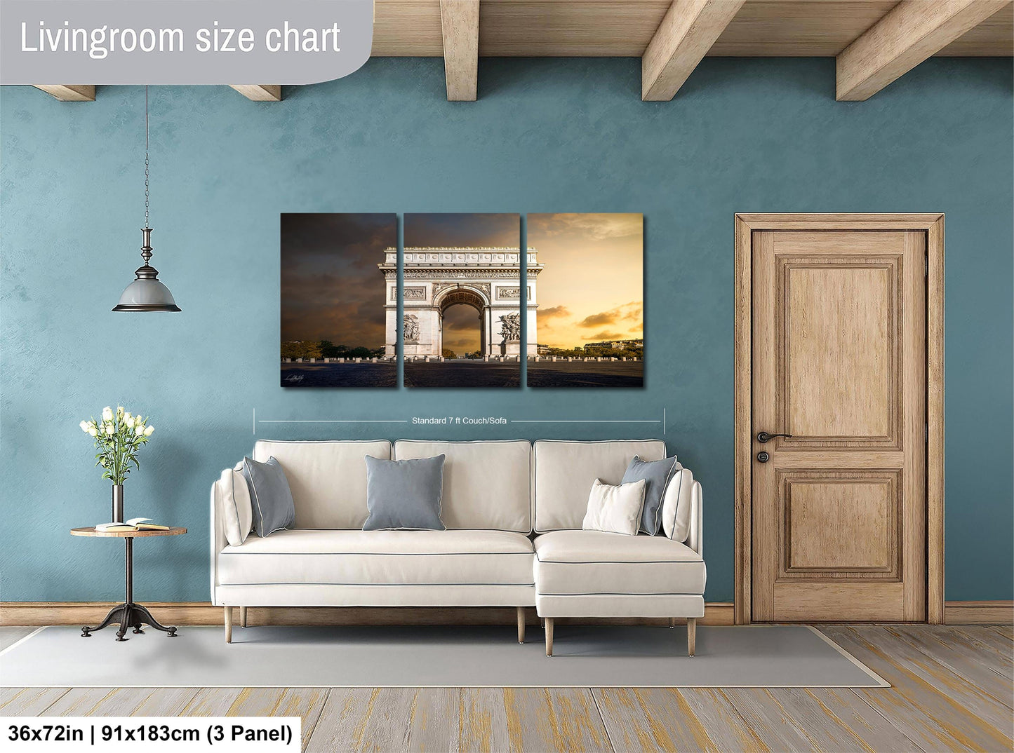 The image is a living room with a large white sofa, a wooden door, and a wall with a large living room size chart. The chart provides dimensions for the living room, including the width and height.