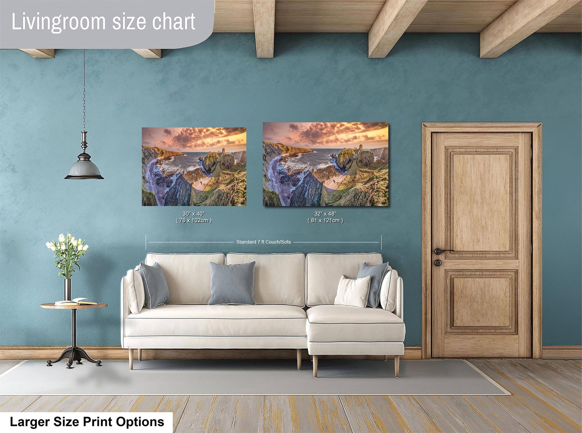 a living room with a couch and two paintings on the wall