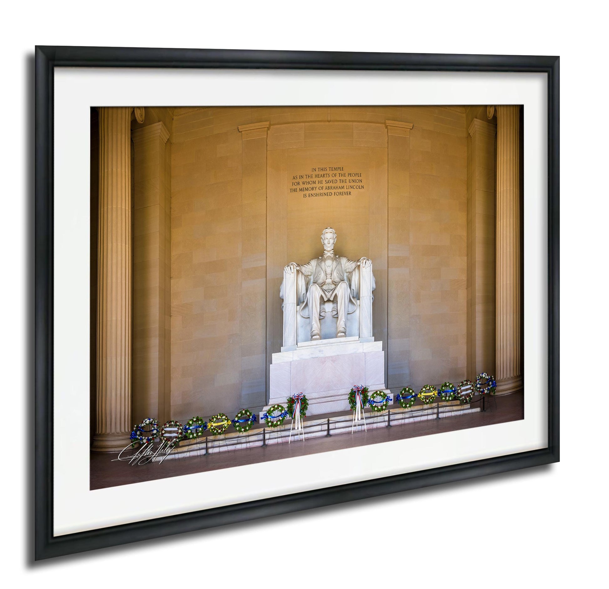 This fine art photograph captures the Lincoln Memorial in Washington DC during the quiet beauty of sunrise. The iconic marble statue of Abraham Lincoln sits beneath the powerful inscription honoring the president who preserved the Union. With soft morning light illuminating the historic monument and ceremonial wreaths placed along the base, this image celebrates one of America’s most meaningful landmarks. Perfect for collectors of Washington DC photography, presidential history artwork
