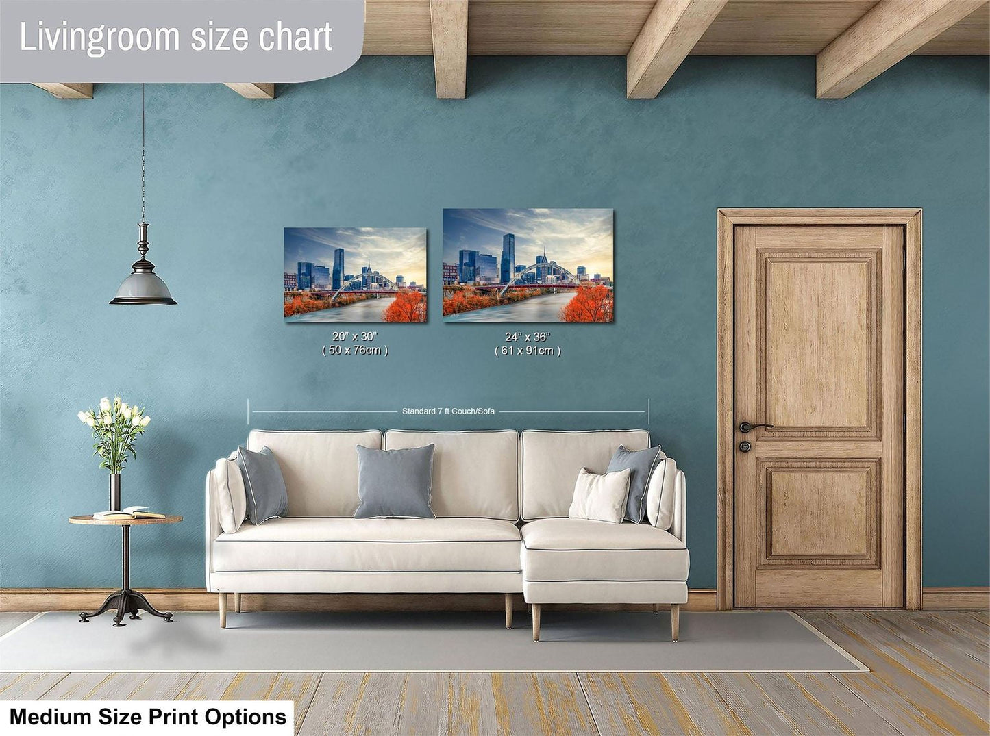 a living room with a white sofa, a wooden door, and a painting of a cityscape on the wall. The painting is of a medium size, and the living room appears to be designed for a comfortable and relaxing atmosphere.