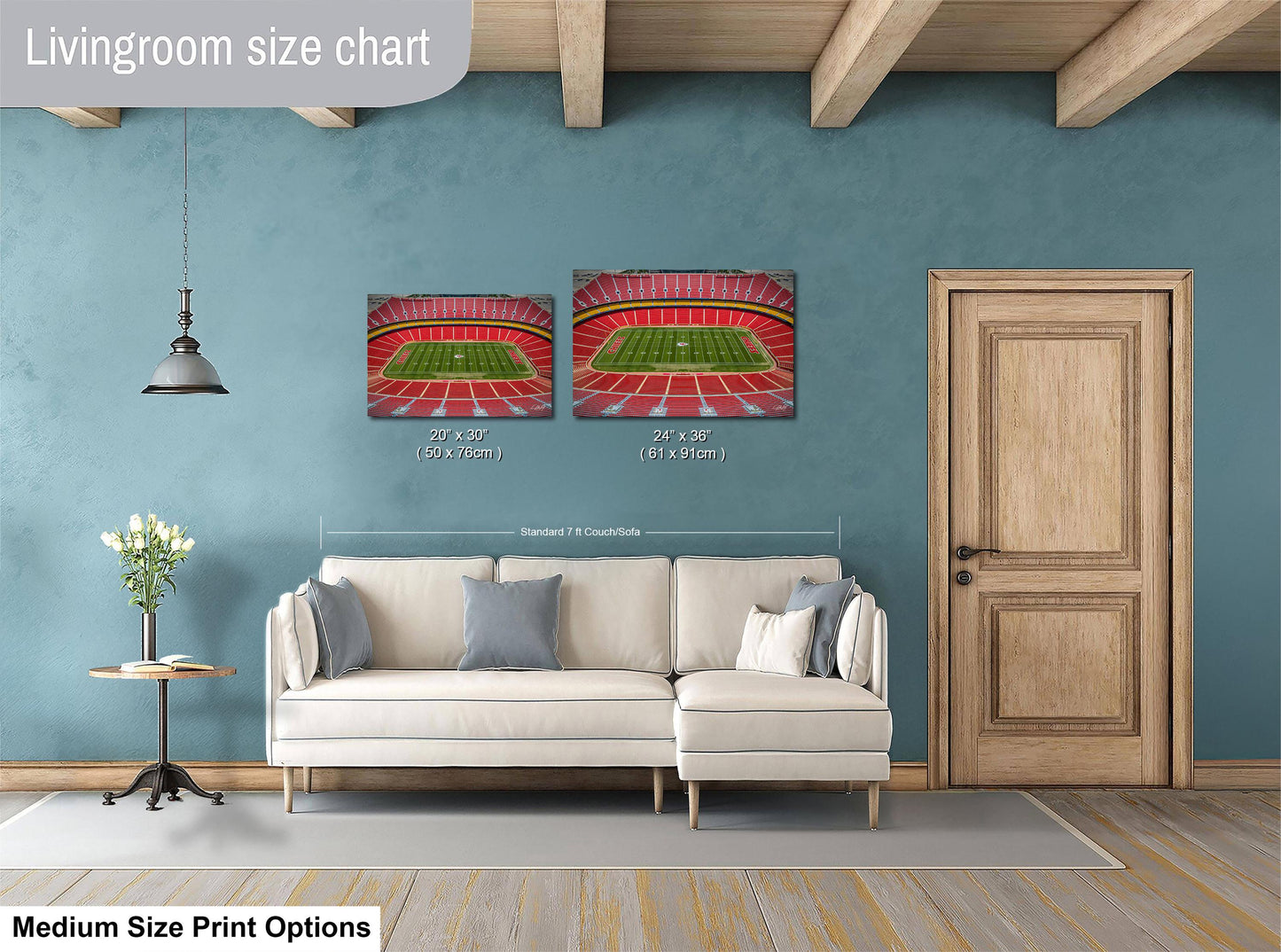 a living room with a white sofa, a wooden door, and a painting of a stadium on the wall. The painting is of a football stadium, and the sofa is white with gray pillows. The wall has a blue color, and there is a lamp hanging from the ceiling. The image is labeled as a livingroom size chart, and it includes a medium size print option.