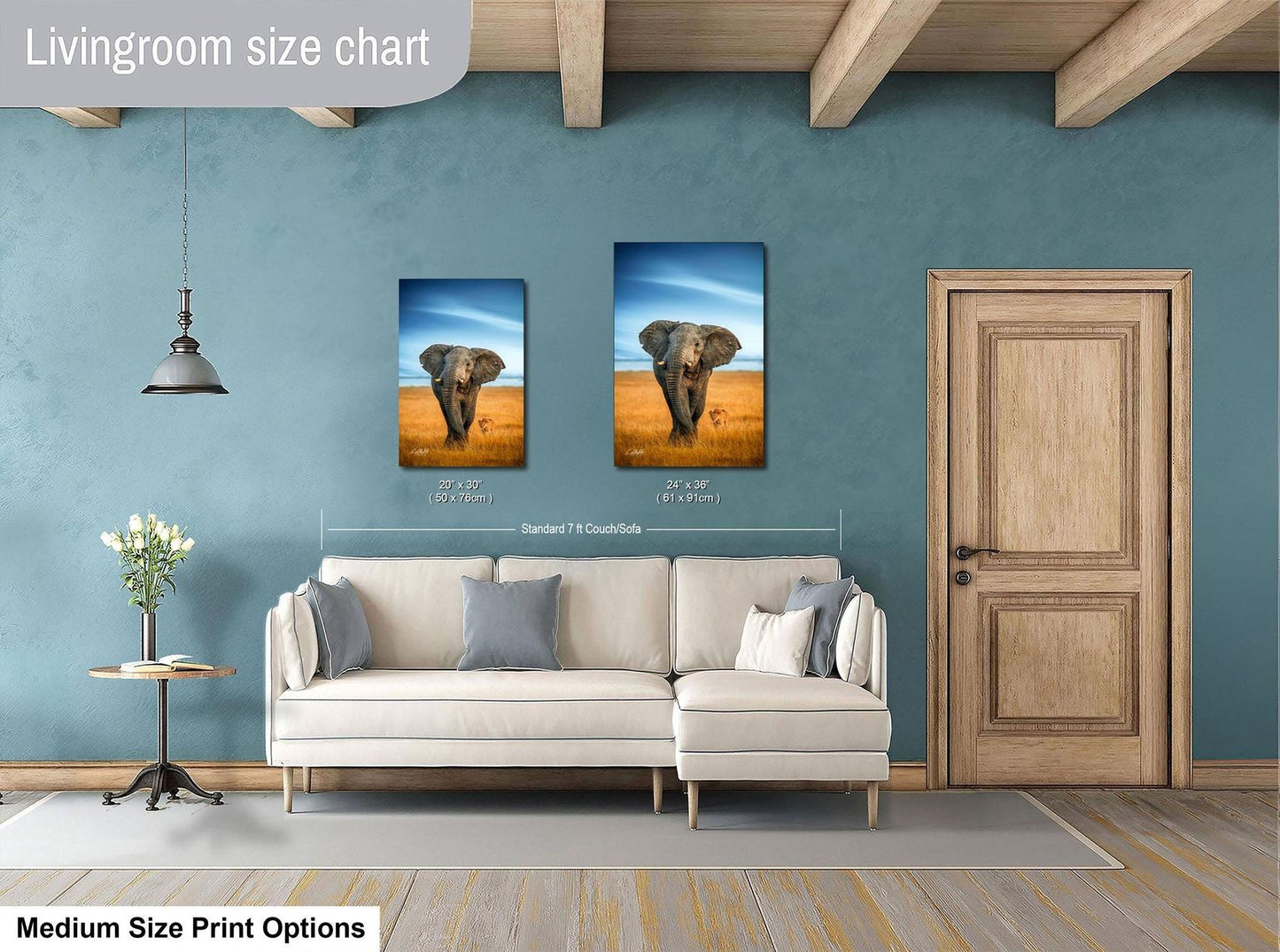 a living room with a white sofa, a wooden door, and a painting of an elephant on the wall. The painting is of a standard size of 24x36 inches.