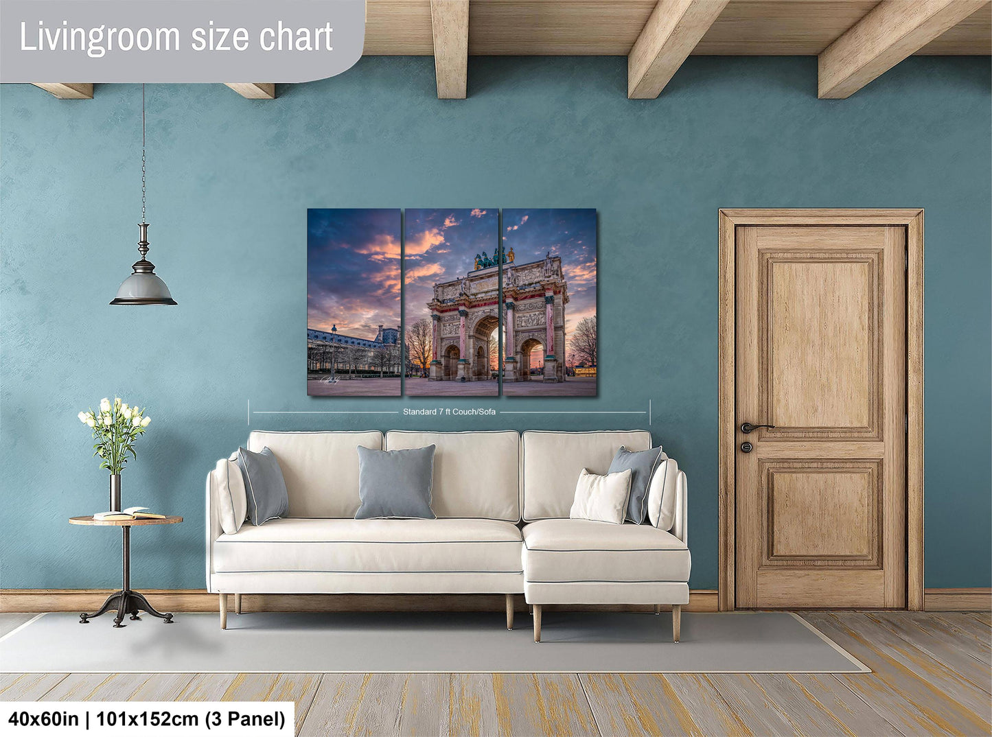 The image is a living room with a large, three-panel living room size chart on the wall. The chart displays the dimensions of the living room in feet and inches, with the largest panel being 40 inches by 101 inches and the smallest panel being 40 inches by 150 centimeters. The living room features a white sofa, a wooden door, and a vase of flowers on a small table.