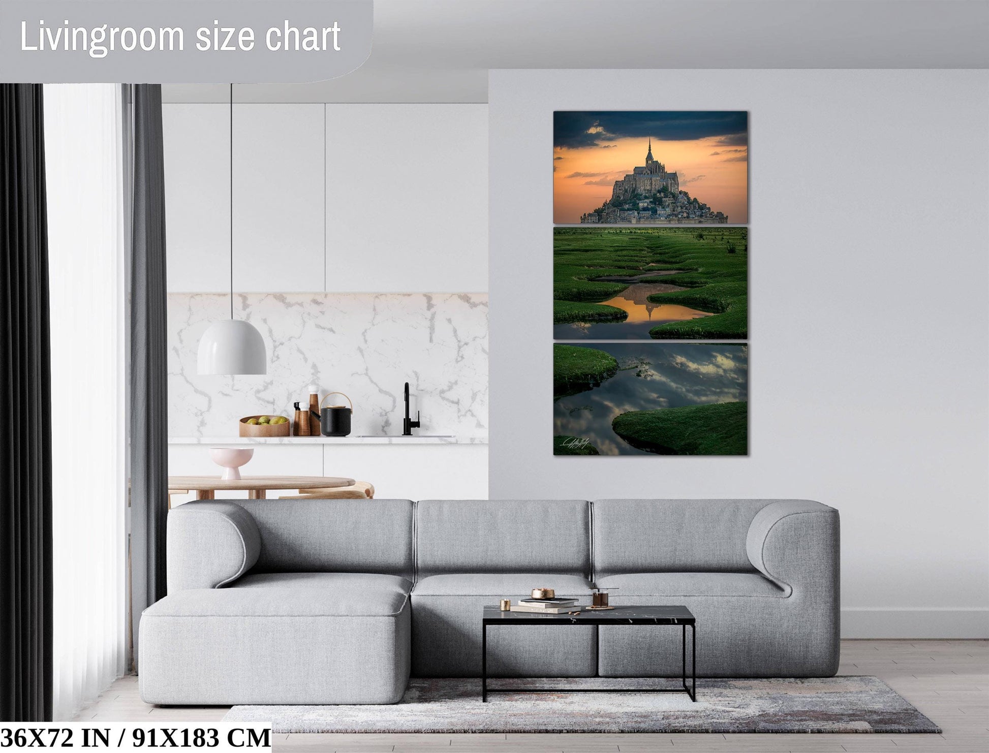 The image is a living room with a gray sofa, a coffee table, and a large painting of a castle in the background. The painting is a triptych, with the top and bottom panels depicting a castle and a river, respectively. The room has a modern and minimalist design, with white walls and a gray sofa.