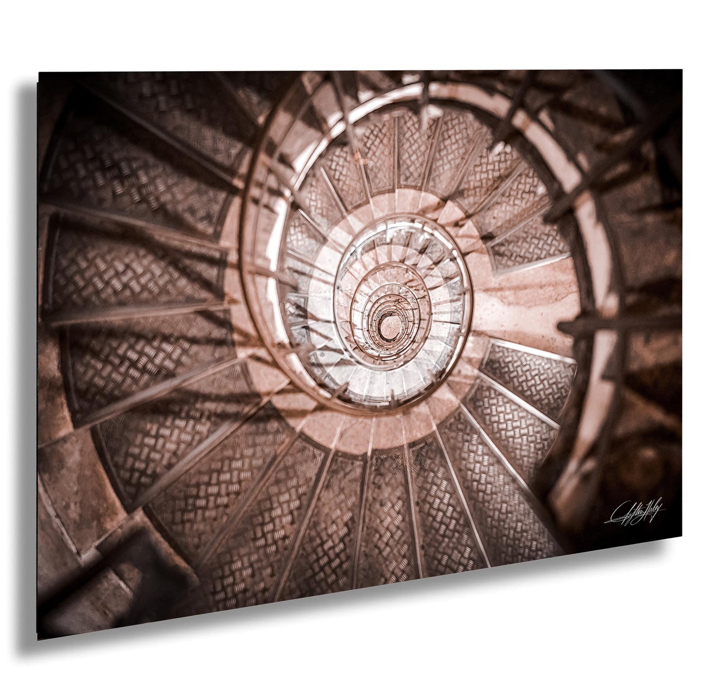 a spiral staircase with intricate patterns and designs, creating a visually captivating and mesmerizing effect.