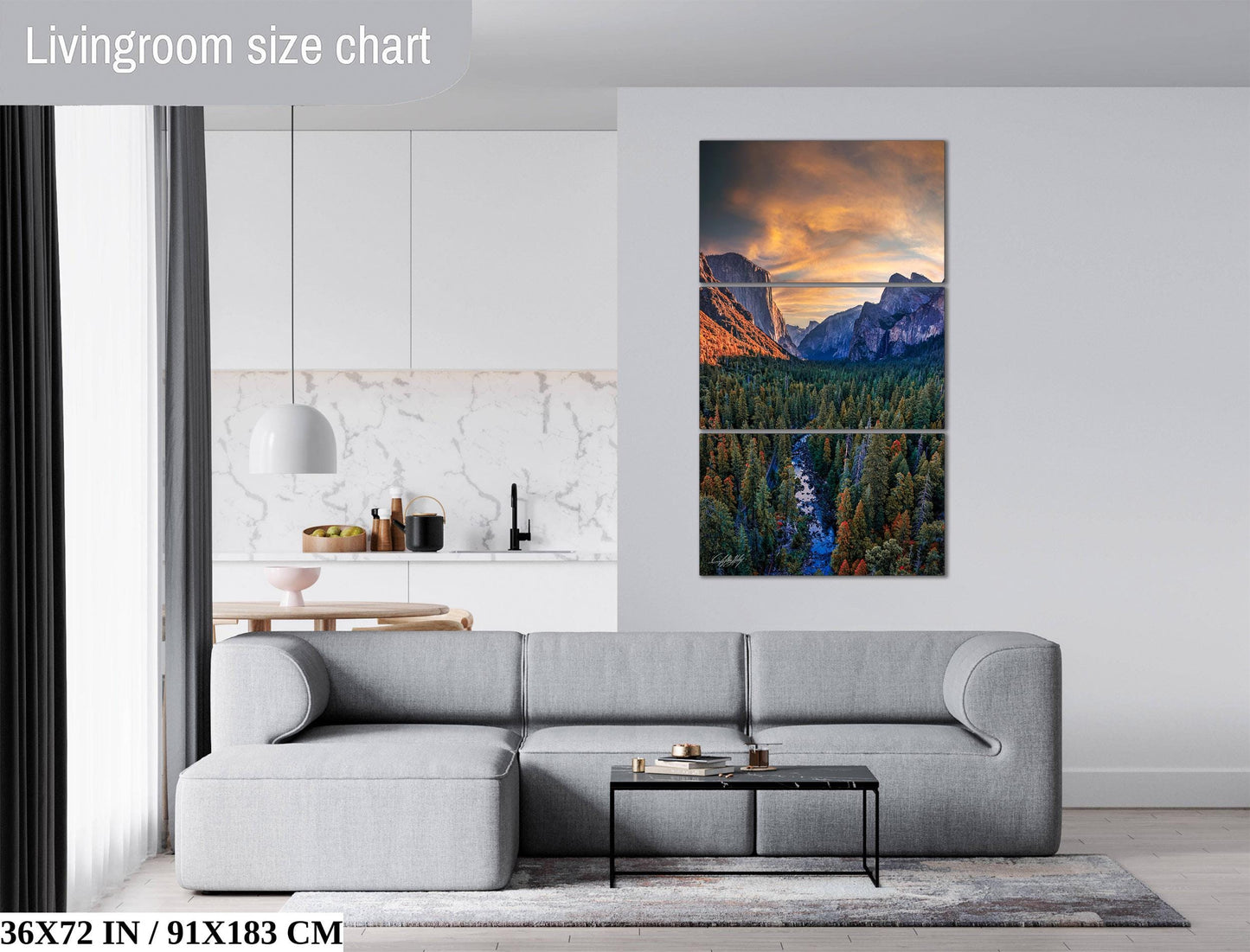 The image is a living room with a gray sofa, a coffee table, and a large landscape painting depicting a mountain range with a river.