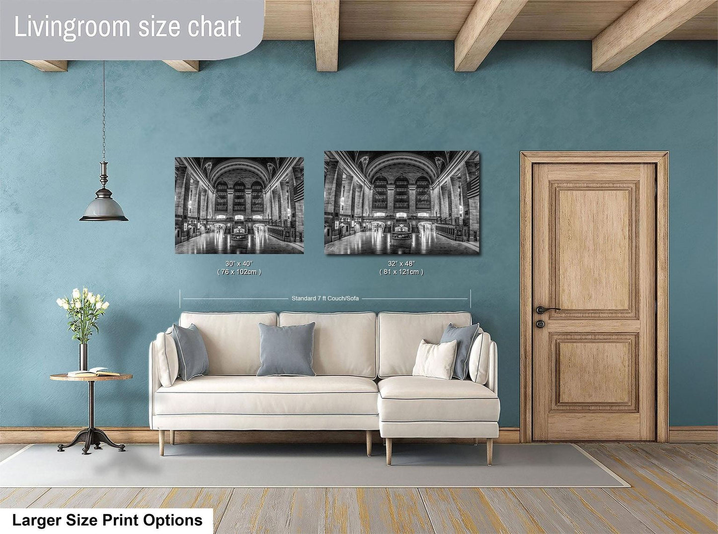 a living room with a white sofa, a wooden door, and a framed black and white photograph of a building. The living room appears to be modern and well-decorated.