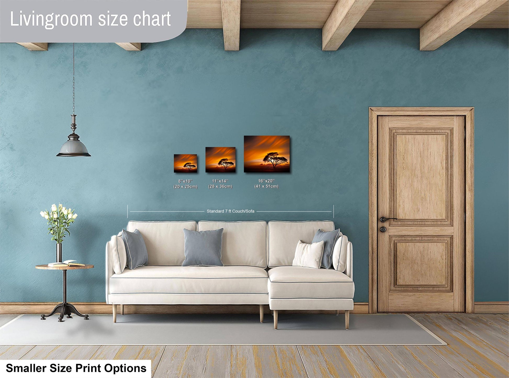 a living room with a white sofa, a wooden door, and a hanging light fixture. There are three framed pictures hanging on the wall, each with different sizes and dimensions. The living room appears to be designed for relaxation and comfort, with a focus on the furniture and decor.