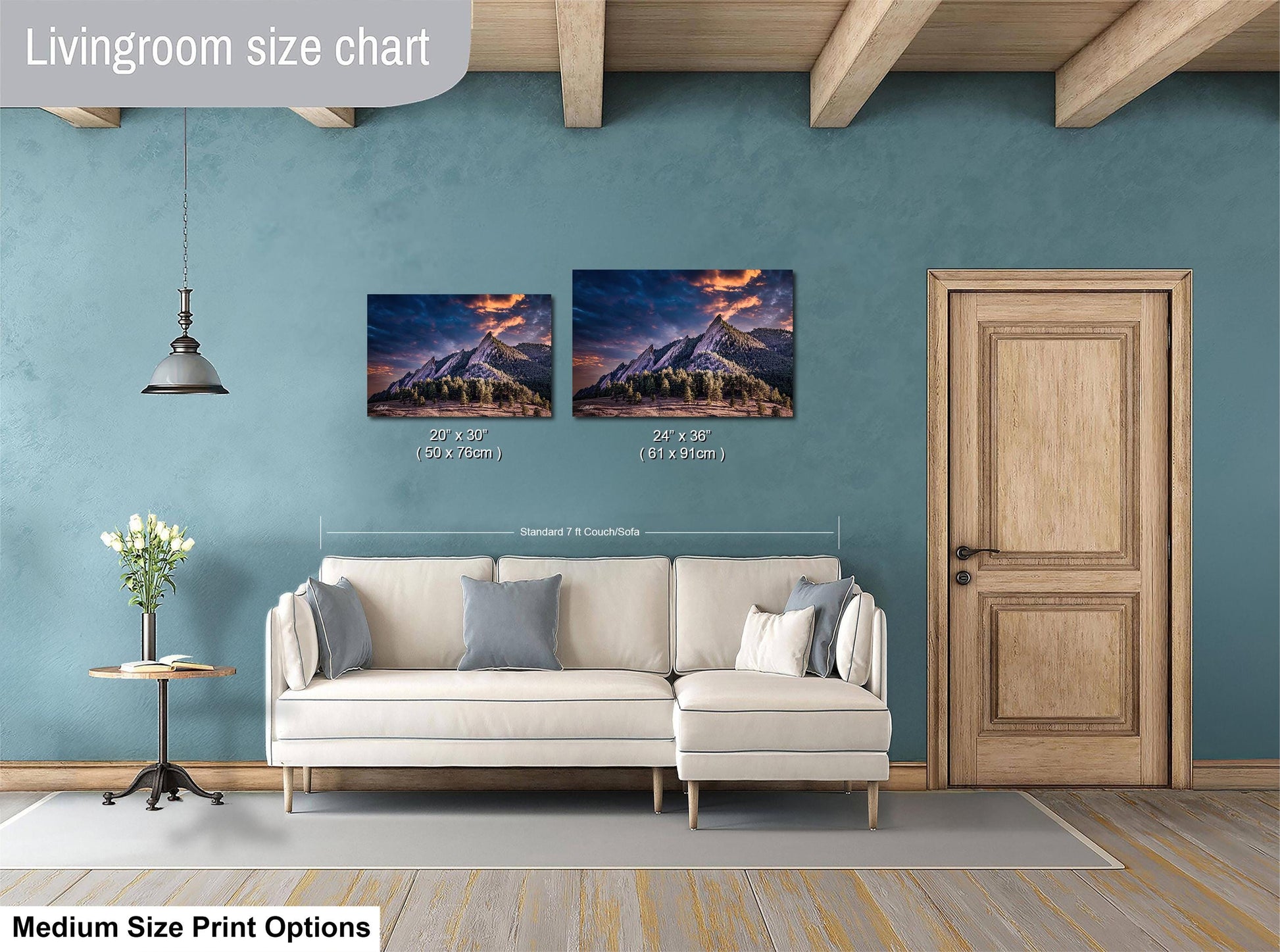a living room with a white sofa and a wooden door. Above the sofa, there is a size chart for a painting, indicating the dimensions of the artwork in both inches and centimeters.