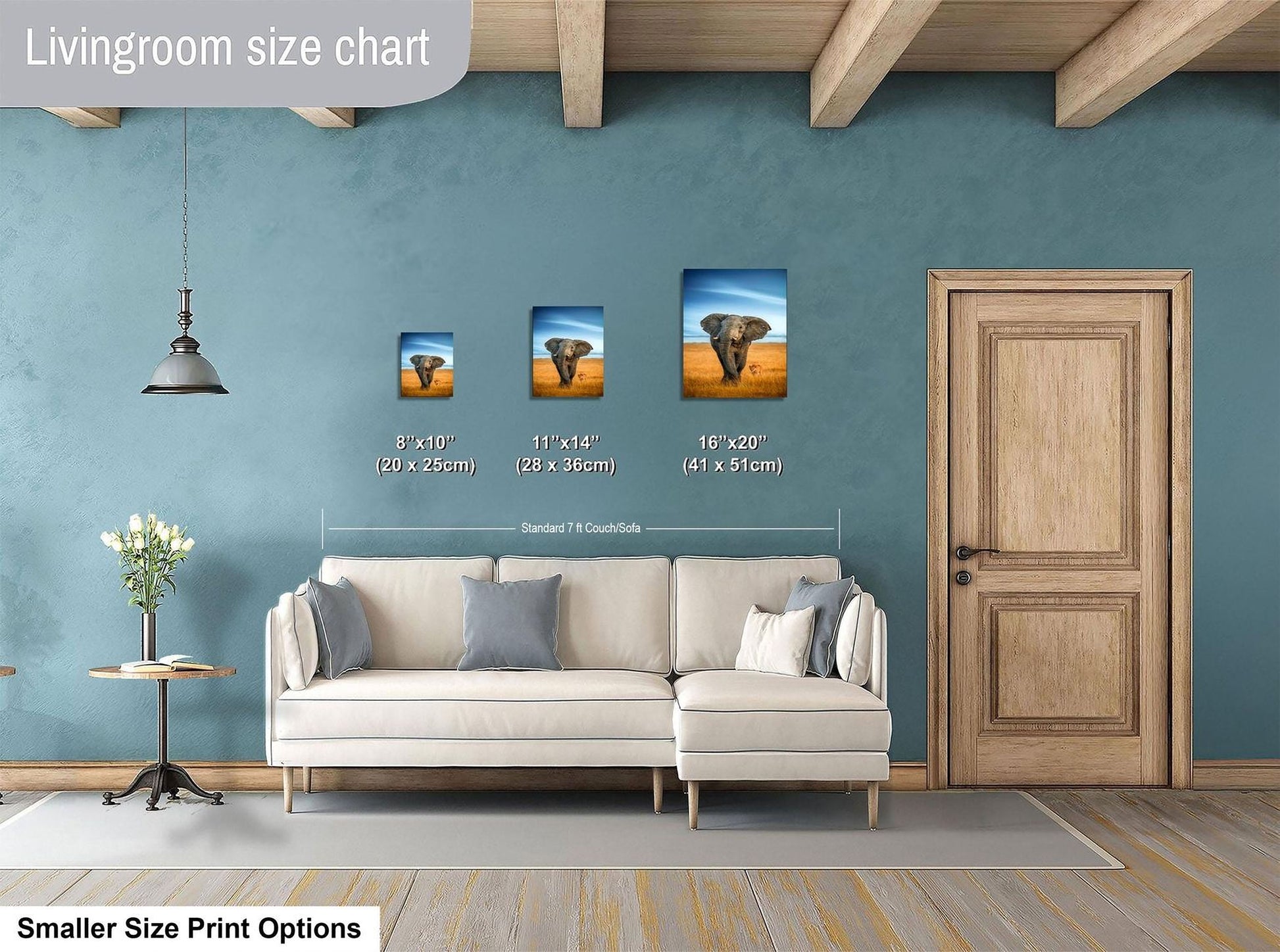 a living room with a white sofa and a wooden door. Above the sofa, there is a size chart indicating the dimensions of three different paintings of elephants.