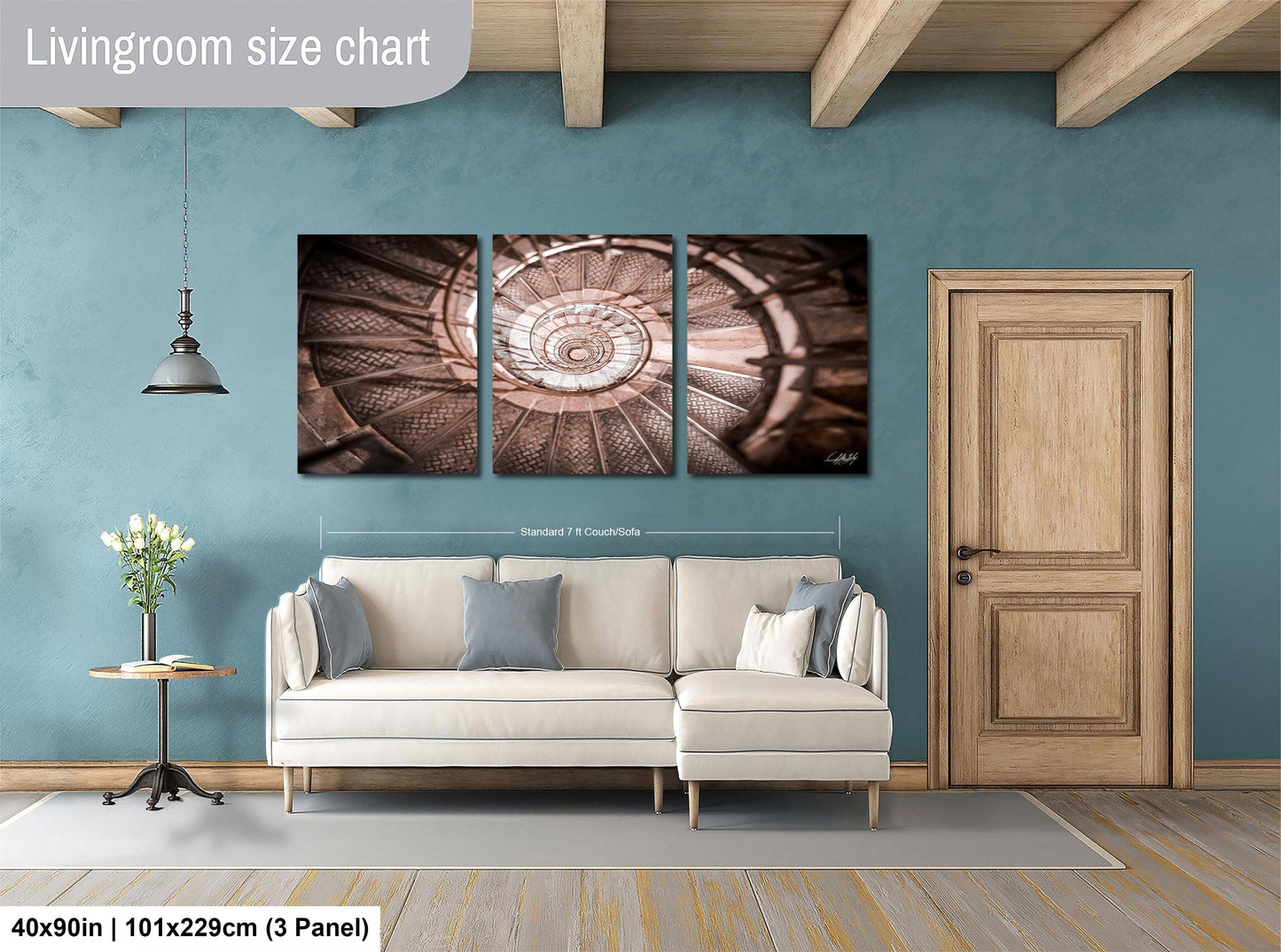The image is a living room with a white sofa, a wooden door, and a painting of a spiral staircase on the wall.
