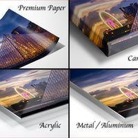 four different views of a cityscape at sunset, with the city's skyline and various structures illuminated by the warm glow of the setting sun.