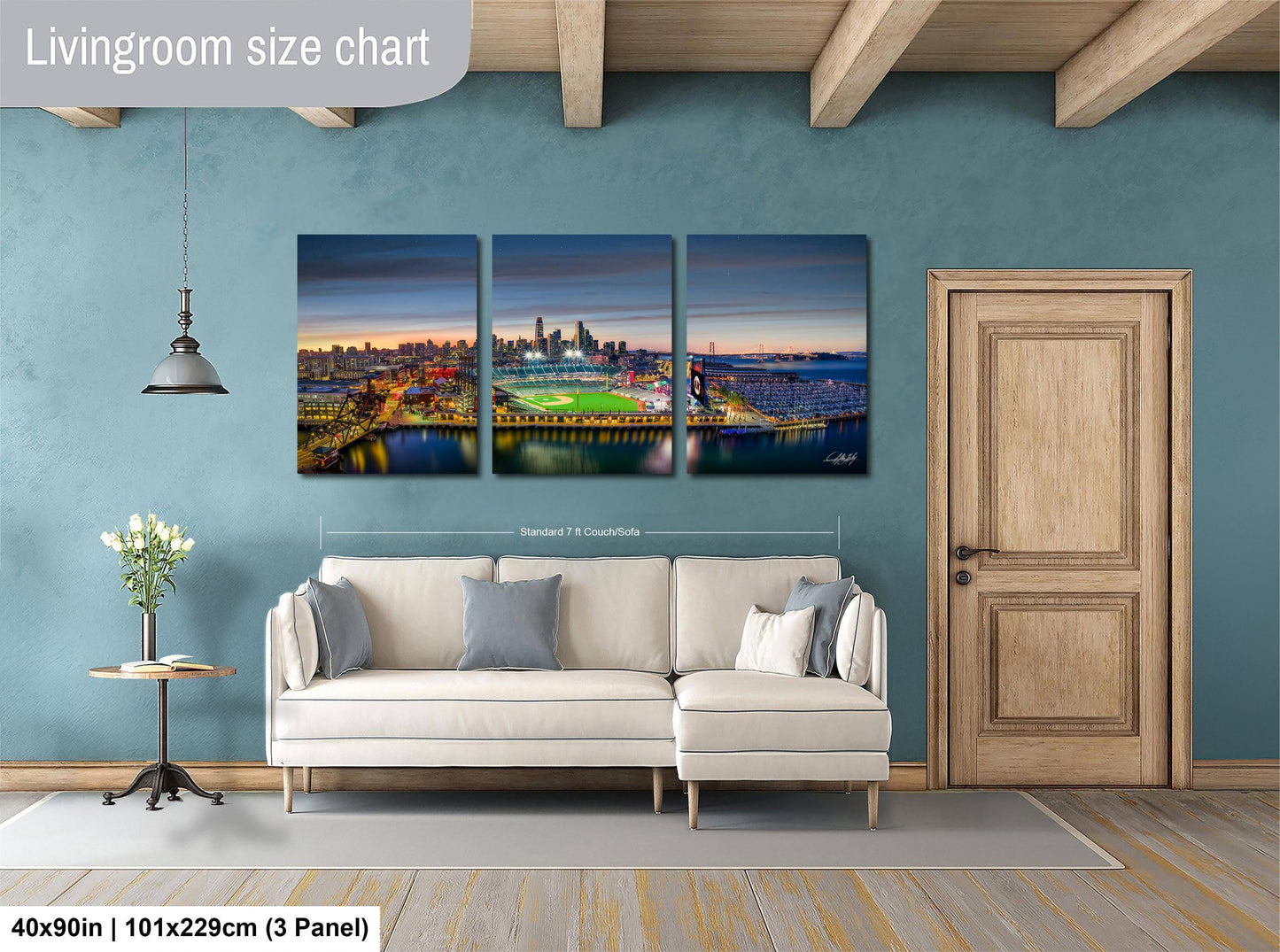 The image is a living room with a large, three-panel living room size chart hanging on the wall. The chart displays the dimensions of the living room in feet and inches, with the largest panel being 40'x50'', the medium panel being 101'x129'', and the smallest panel being 3'x3'', providing a clear visual representation of the room's size.