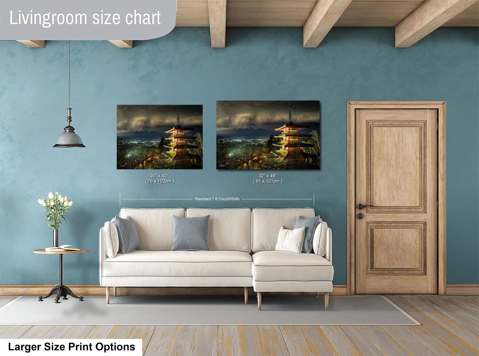 a living room with a white sofa, a wooden door, and a painting of a temple on the wall. The painting is of a temple with multiple levels and is displayed in two sizes: a standard size of 61 x 42 inches and a larger size of 81 x 120 inches.