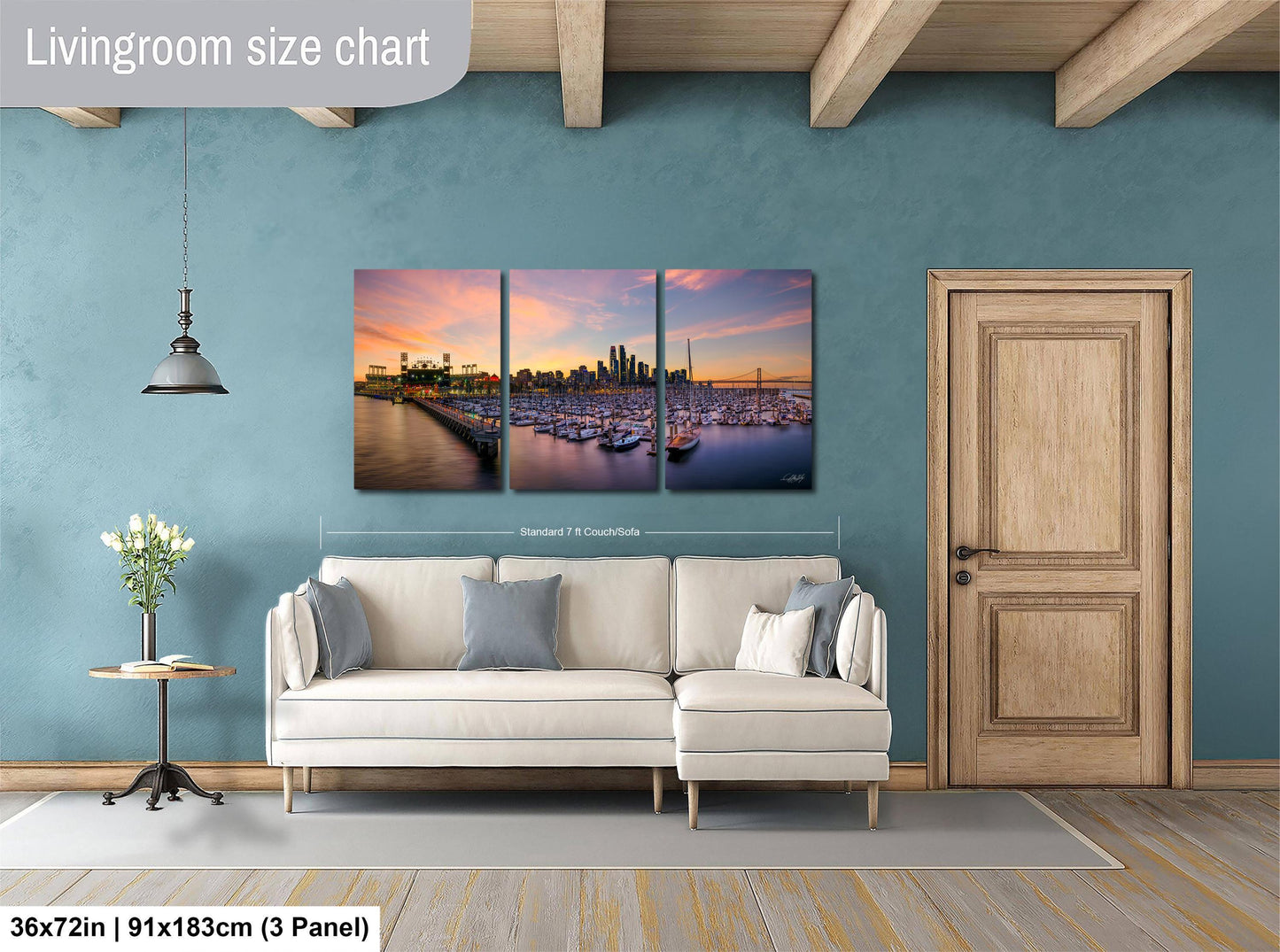 The image is a living room with a large, three-panel living room size chart on the wall. The chart displays the dimensions of the living room in both square feet and square meters. The living room is furnished with a white sofa and a wooden door, and there is a vase of flowers on a table nearby.