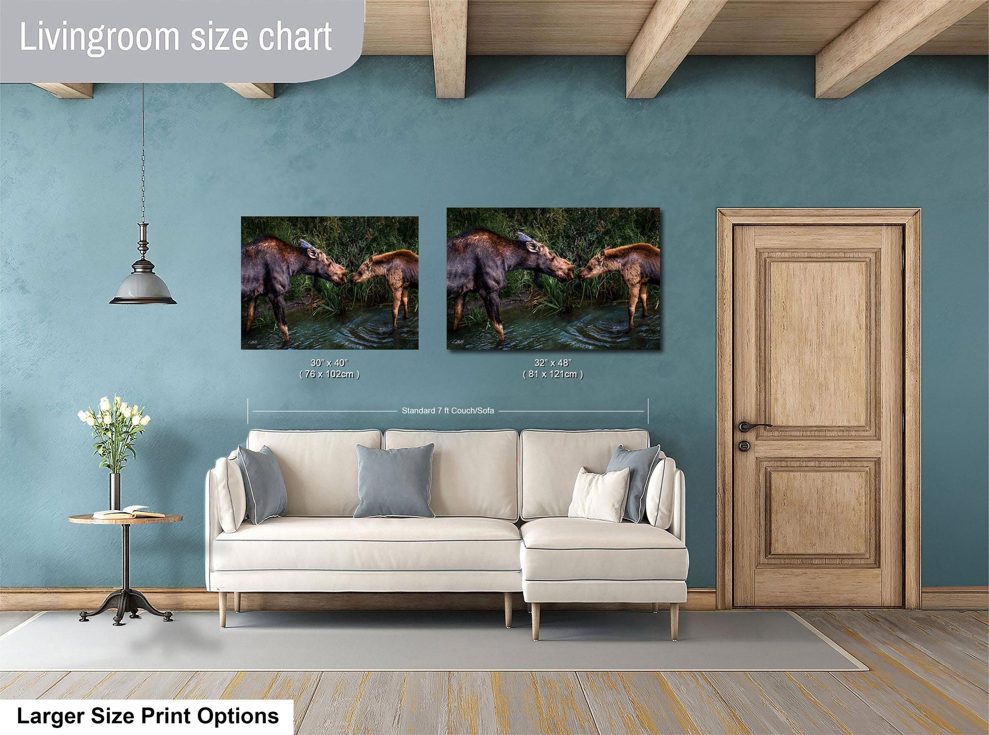 a living room with a white sofa, a wooden door, and a painting of two animals in a body of water on the wall.