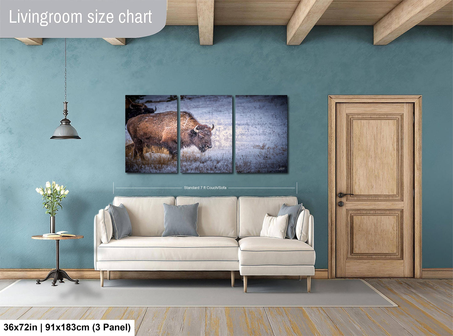 a living room with a couch and a painting on the wall