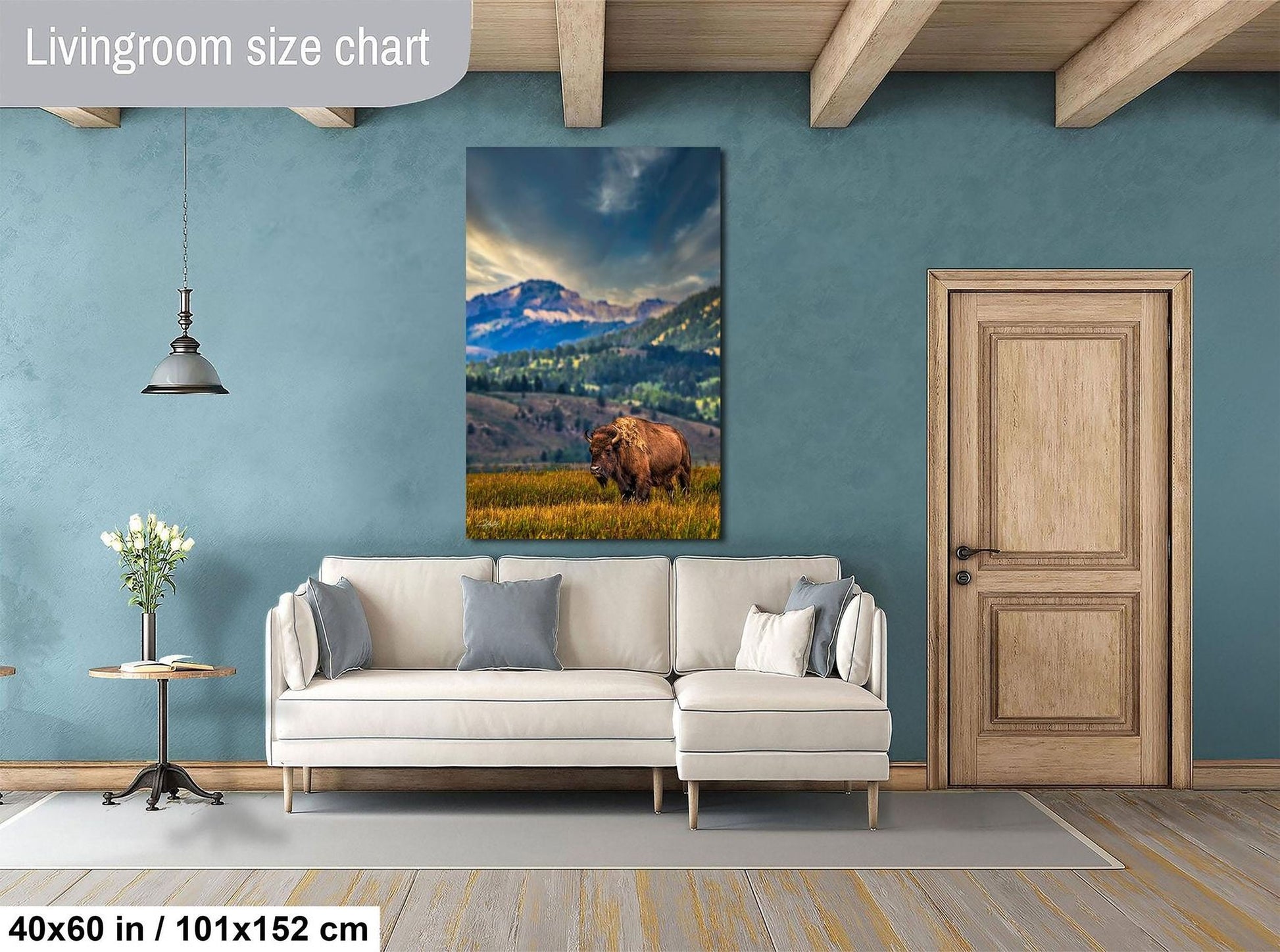 a living room with a large painting of a bear in a grassy field hanging on the wall. The painting is approximately 40 inches wide and 101.5 inches tall.