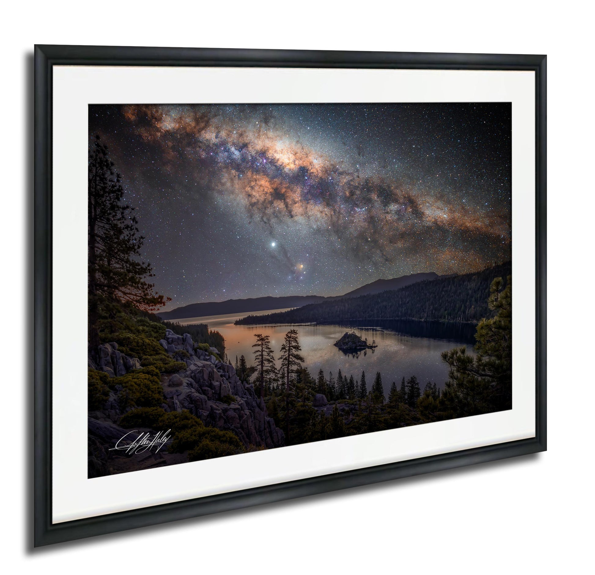 a serene night scene with a lake surrounded by mountains and trees, with a starry sky above.
