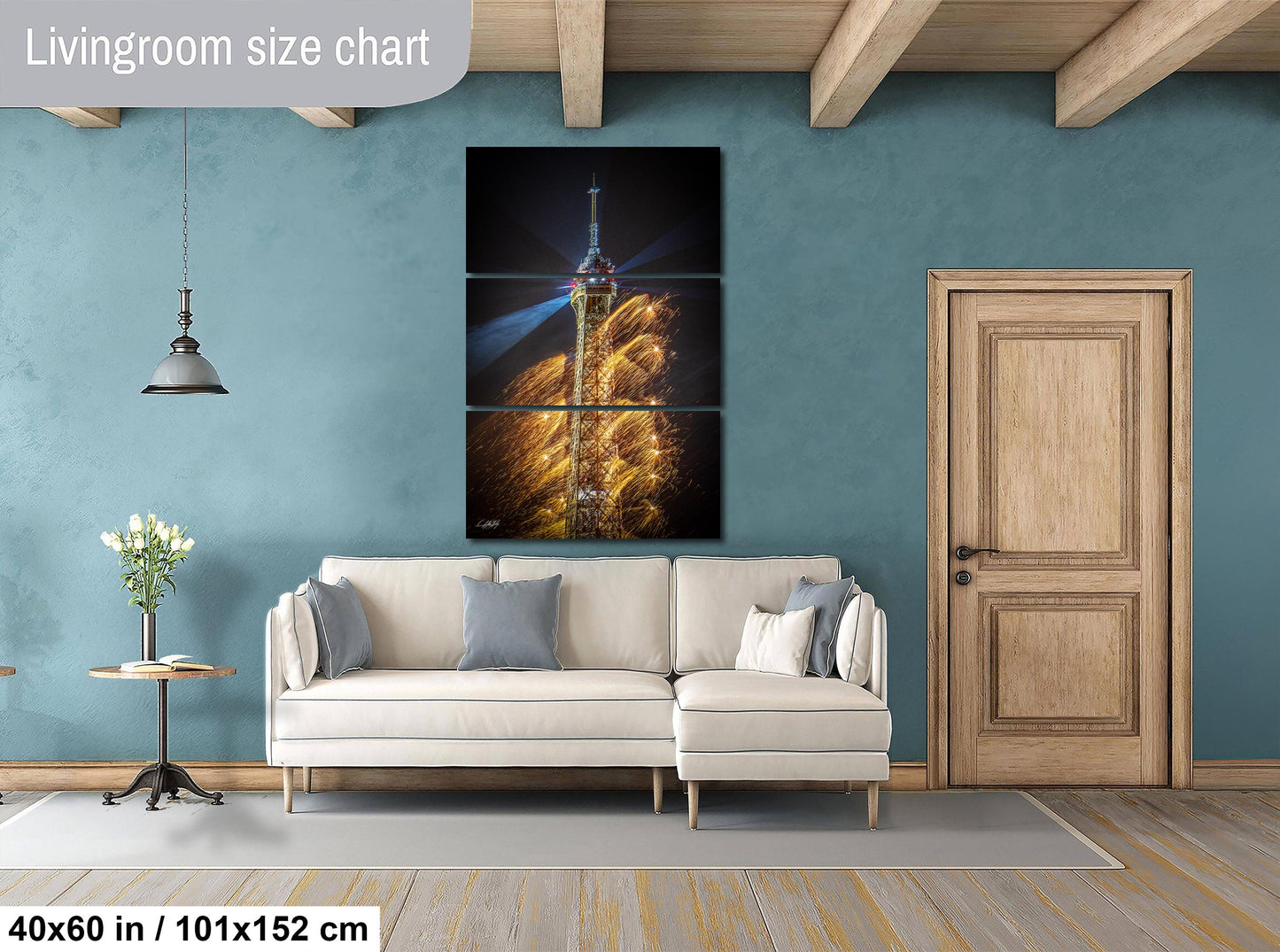 a living room with a couch and a painting on the wall