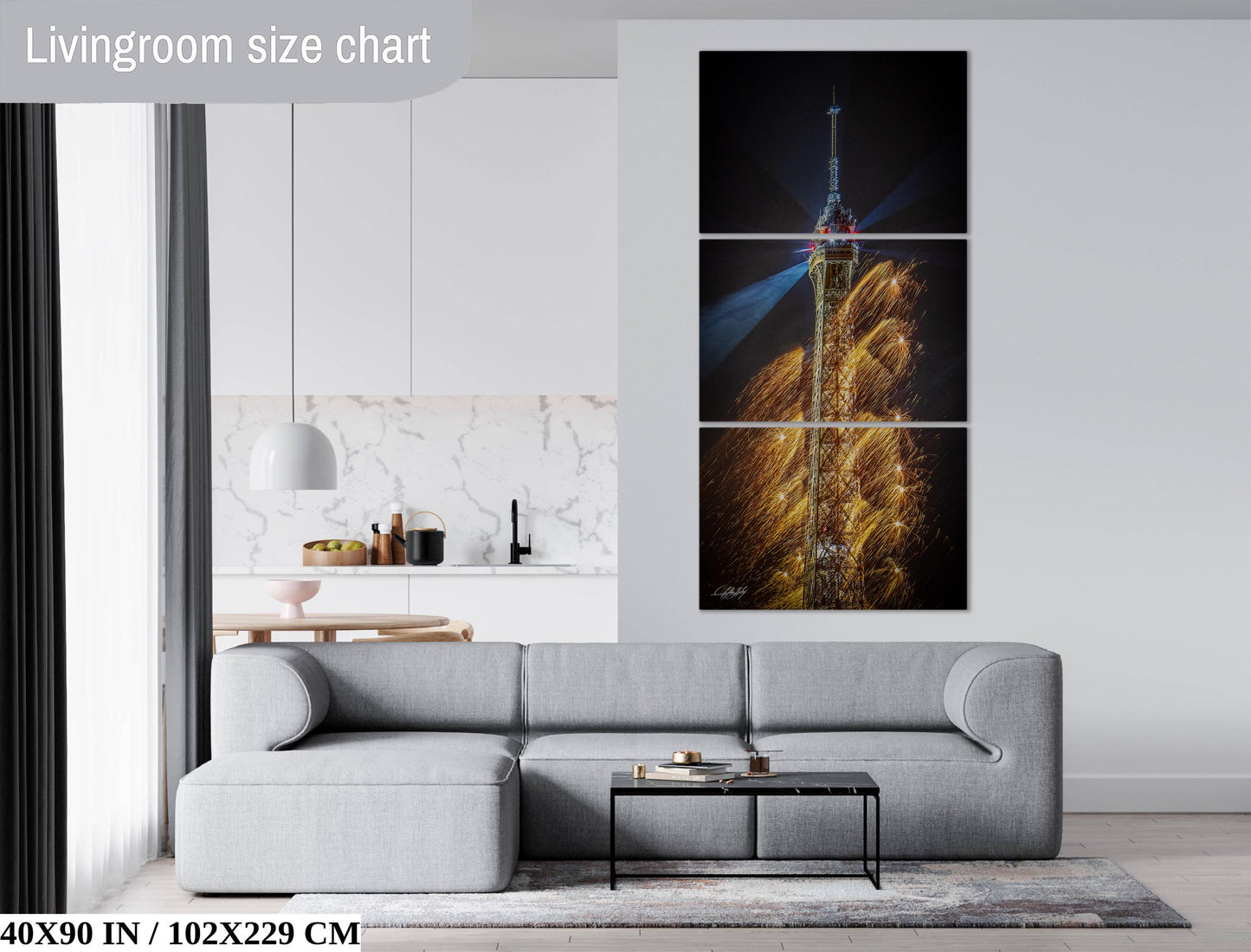 a living room with a couch and a painting on the wall